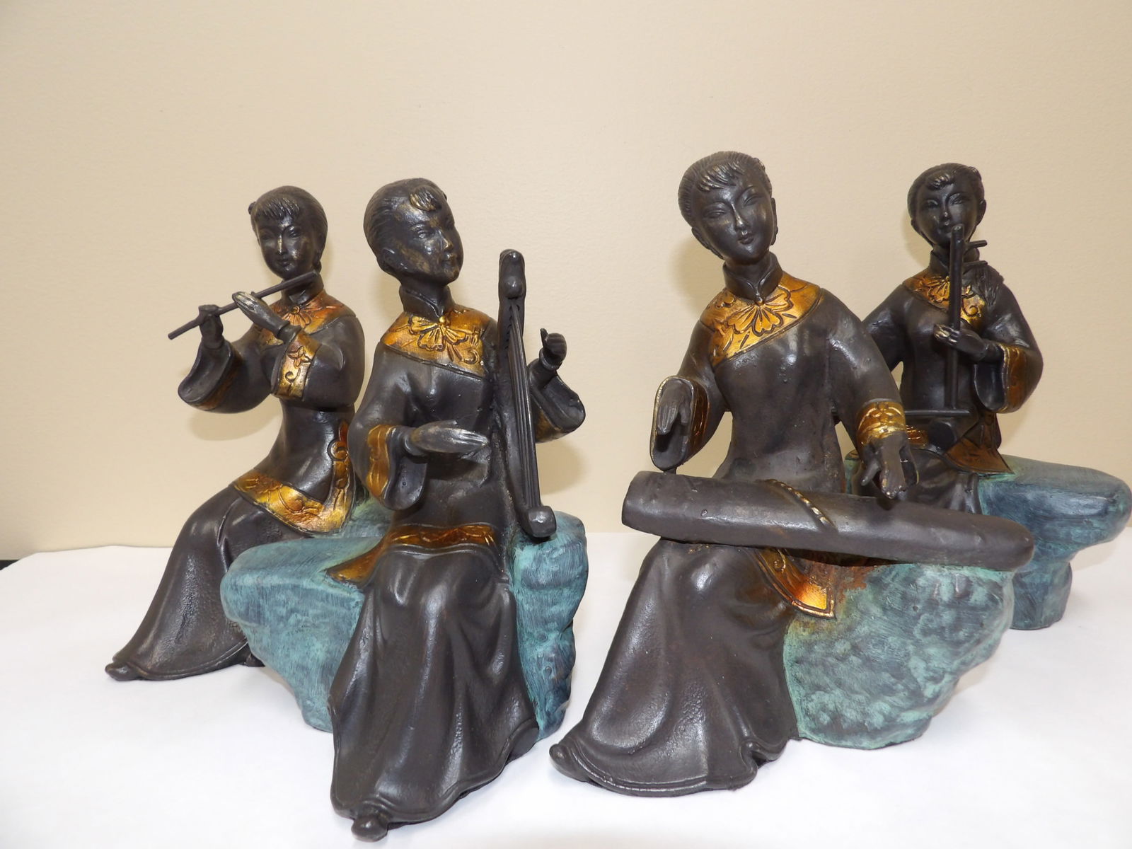 Lot of 4 Chinese cast iron musician statues: Over 9 inches height. Bottom has protective film.