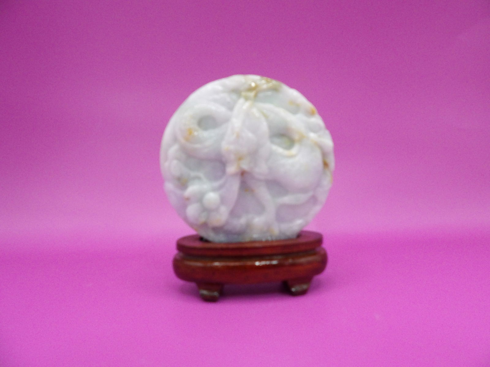 Chinese jadeite jade double sided dragon phoenix carving adhered to wooden base: Jadeite carving is 2.7 inches diameter.