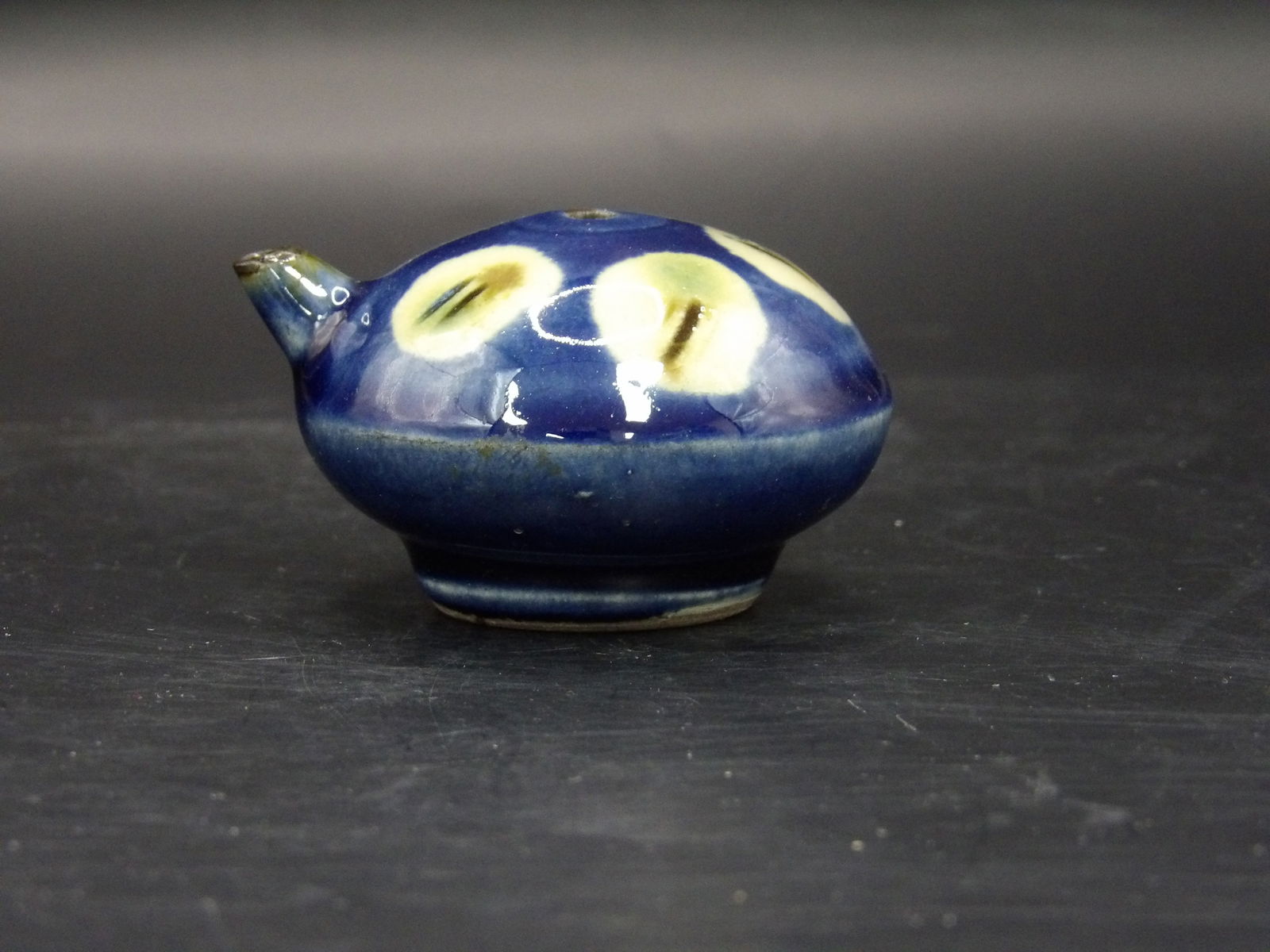 Antique Chinese Blue glazed porcelain water dropper: Unique pattern. Amazing shine. Size is 2.5 x 2.2 x 1.2 inches.