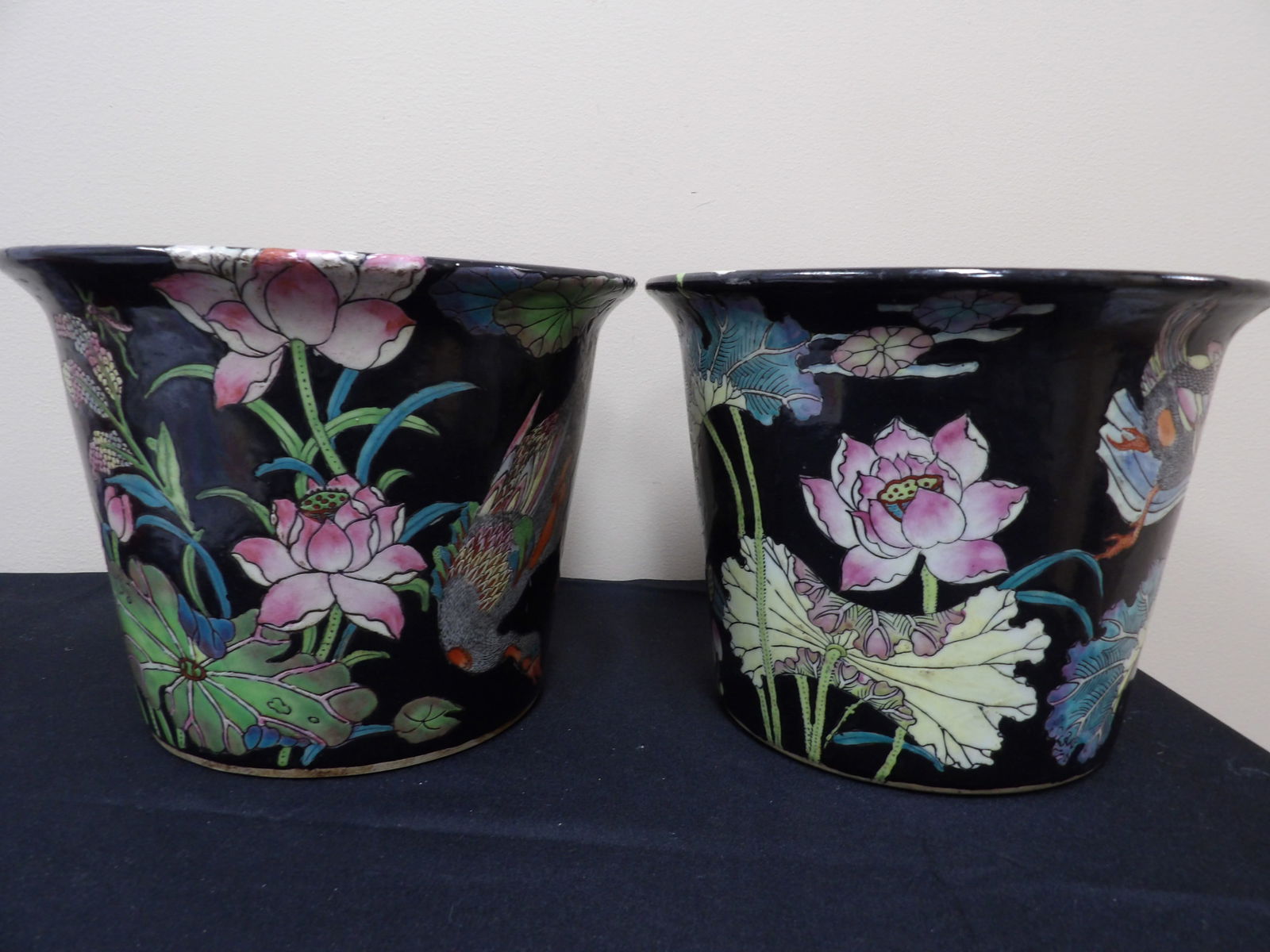 Pair of Chinese Famille Noire planters with water lilies and duck motifs: Size is 9.5 x 9.5 x 7.3 inches.