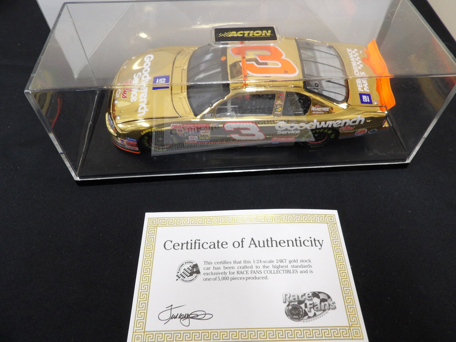Action Performance 24KT gold diecast of Dale Earnhardt's #3 Goodwrench in display case: 8 inches length scale car in 10 inches length display case and 11.7 inches length box.