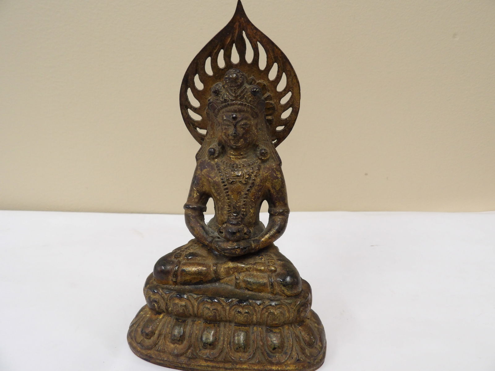 antique Chinese or Japanese gilt bronze seated buddha figurine with flame halo and lotus base (1 of 7)