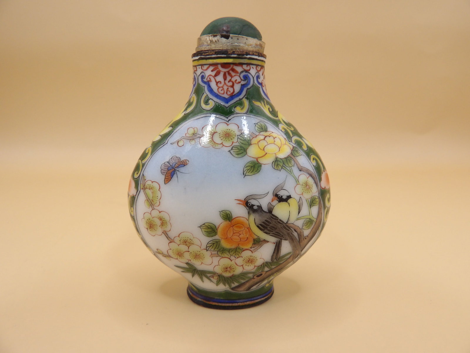 Chinese antique copper enamel snuff bottle with birds flowers and Qing dynasty Qianlong mark: 2.5 inches height.