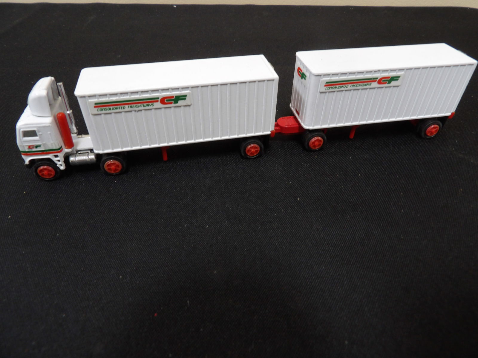 Tonkin diecast model of a Consolidated Freightways double trailer truck: 8 inches length.
