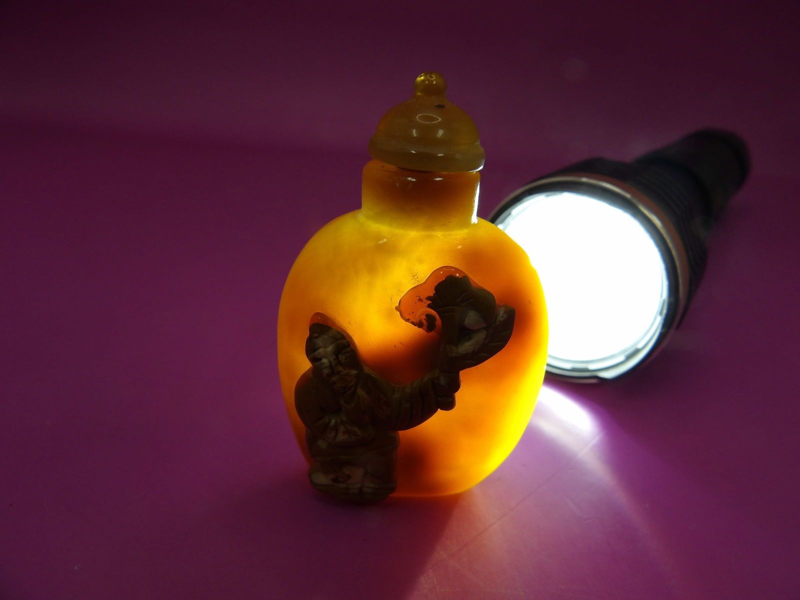 well hollowed Chinese carved agate snuff bottle with raised figural motif (1 of 7)