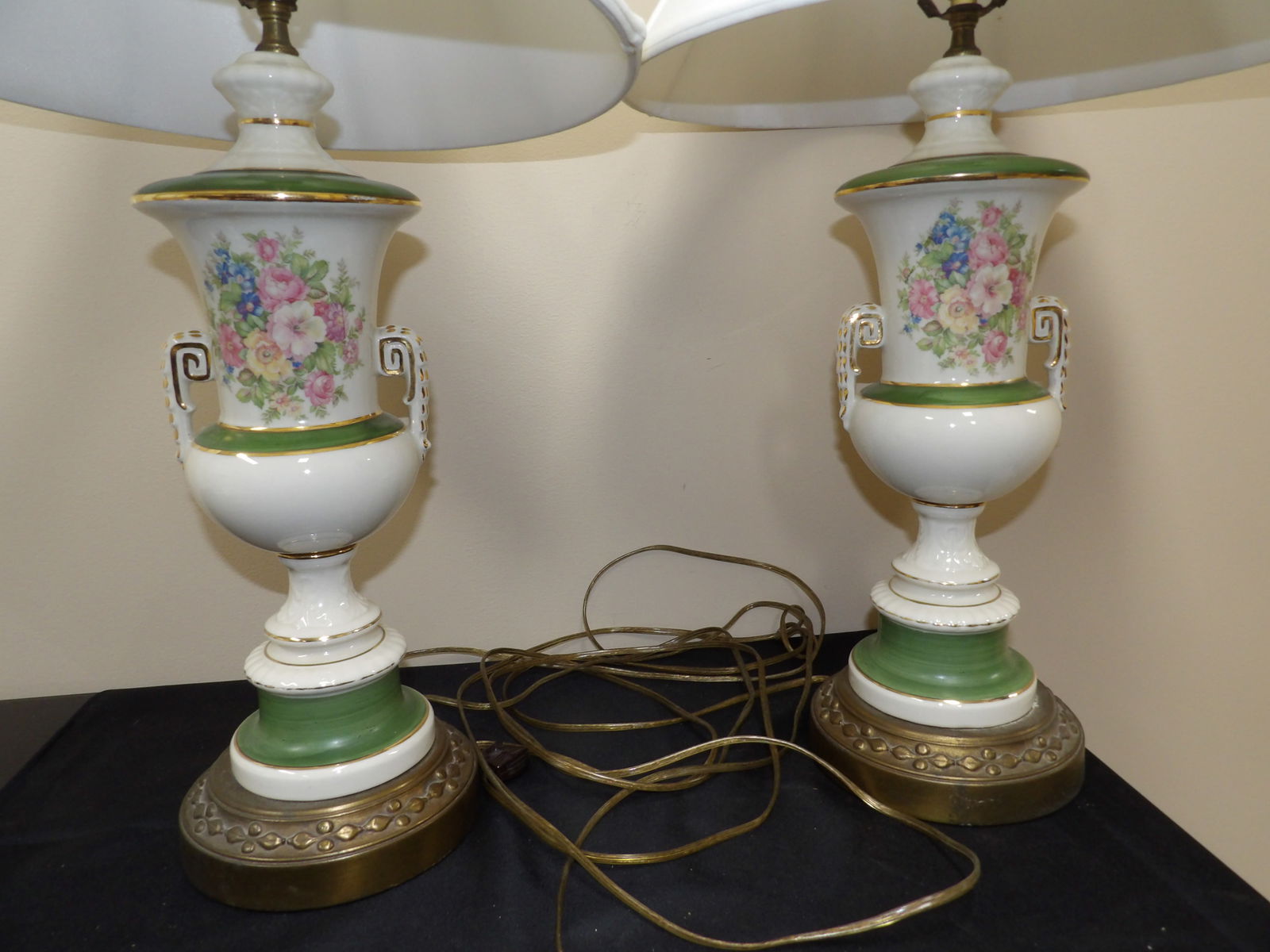 pair of floral motif porcelain urn with gold gilded trims brass lamps: 31 inches height.