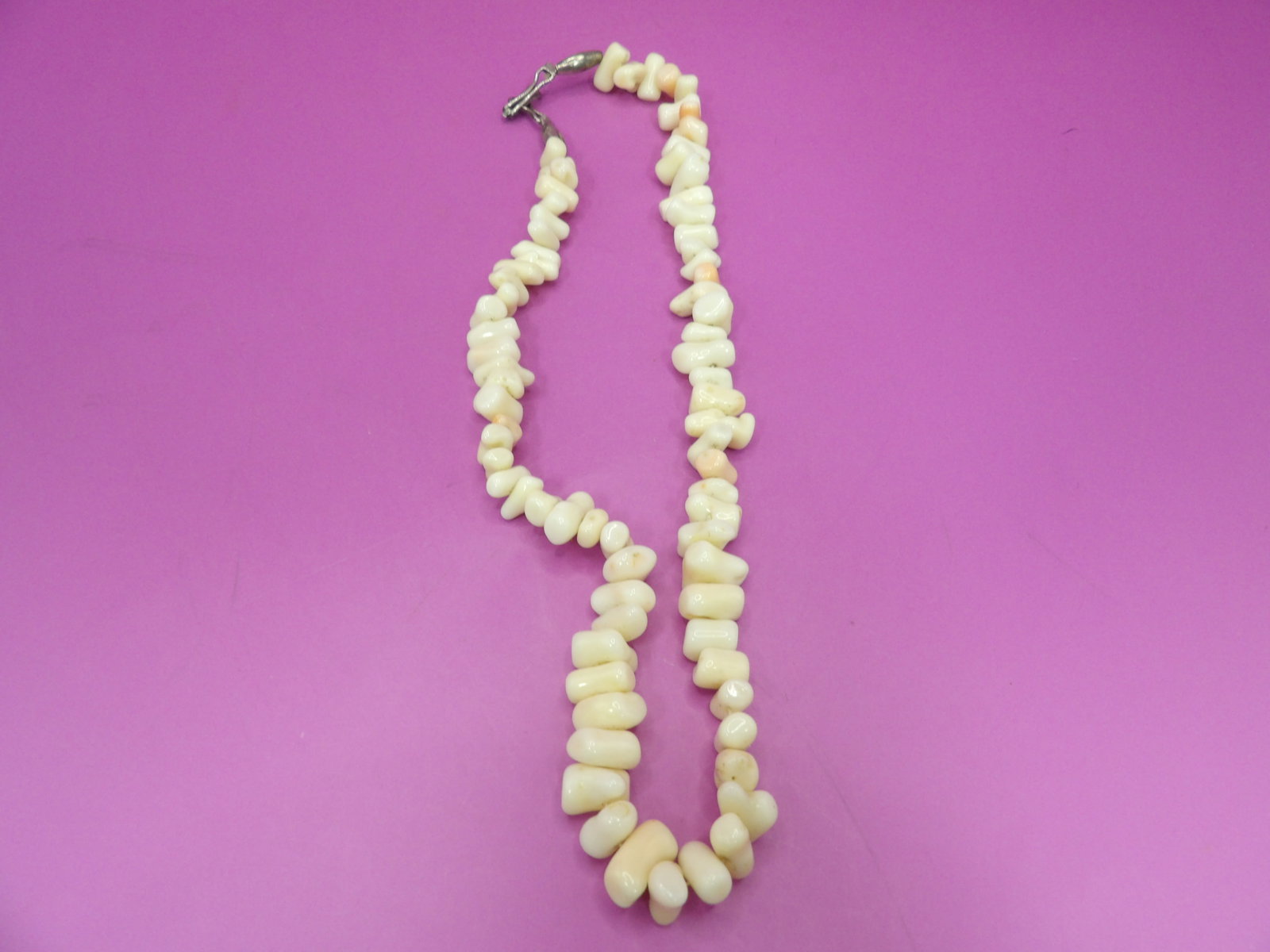 angel skin coral baby teeth shaped necklace (1 of 5)