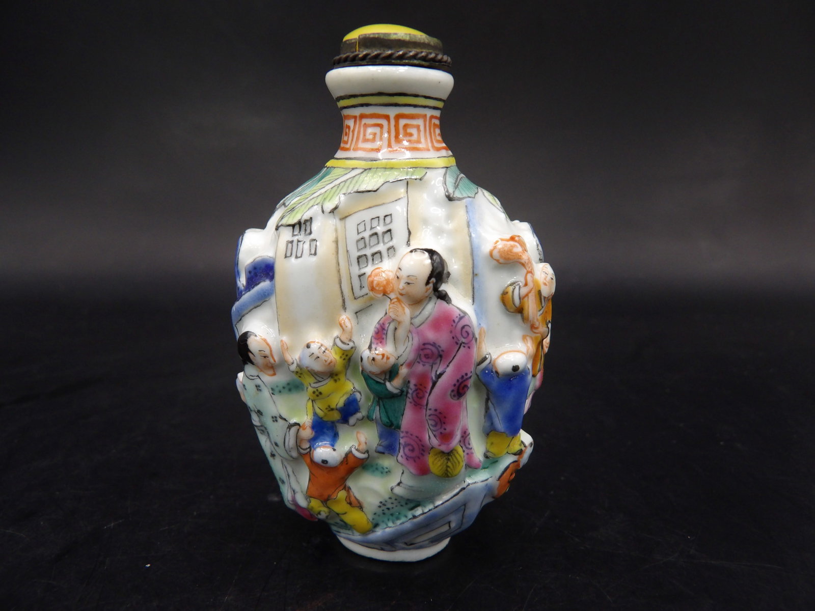 antique Chinese molded porcelain snuff bottle with women children scene: 2.3 inches height.