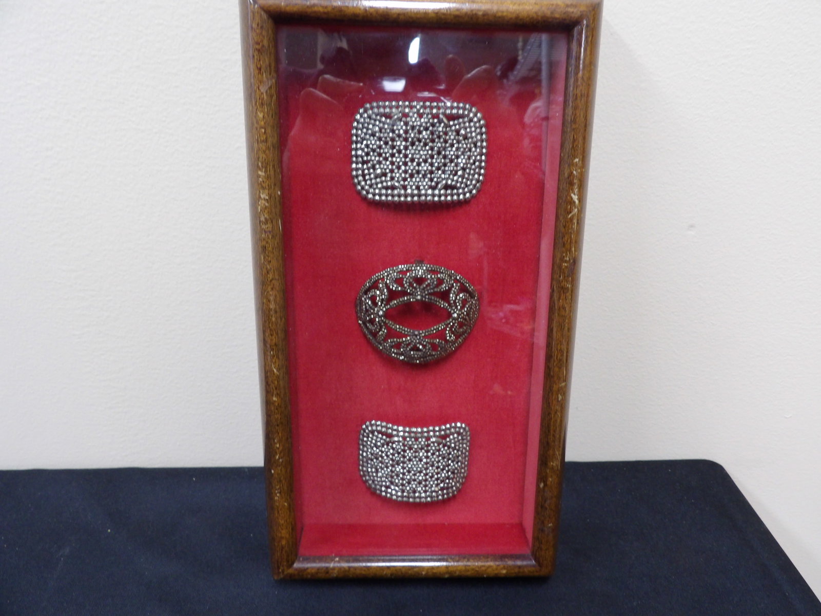 framed antique 3 late 19th century marcasite and steel cut shoe buckles in a shadow box: Box is 11 inches height.