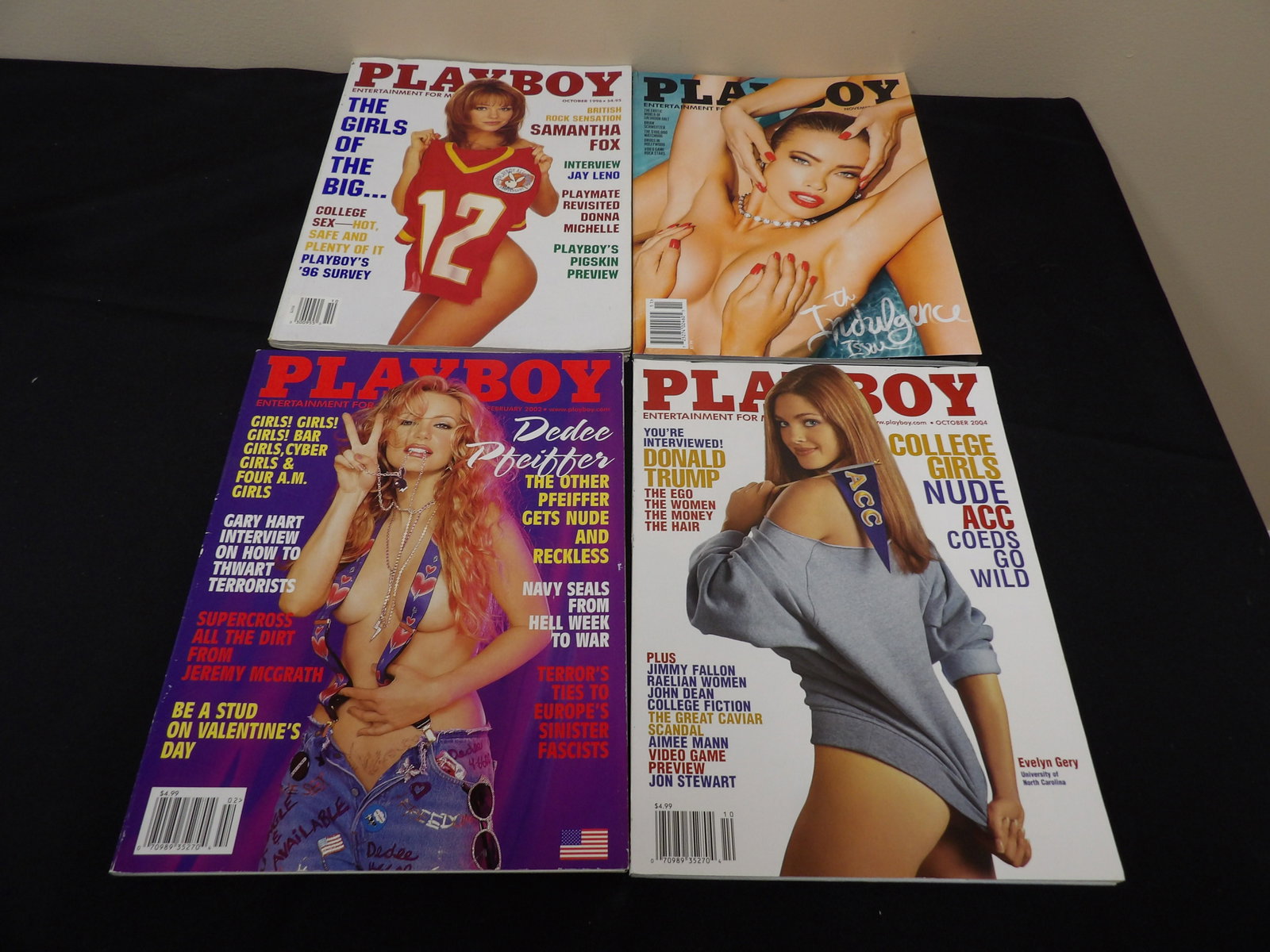 lot of 4 Playboy magazines: Oct 1996, Feb 2002, Oct 2004 and Nov 2014 issues.