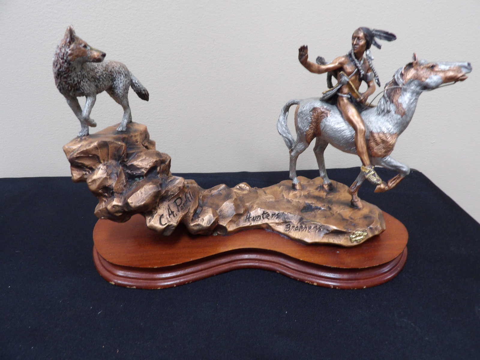 C. A. Pardell "Hunters Brothers" limited edition bronze and mixed metal sculpture: 11 inches length. 9.8 lbs.