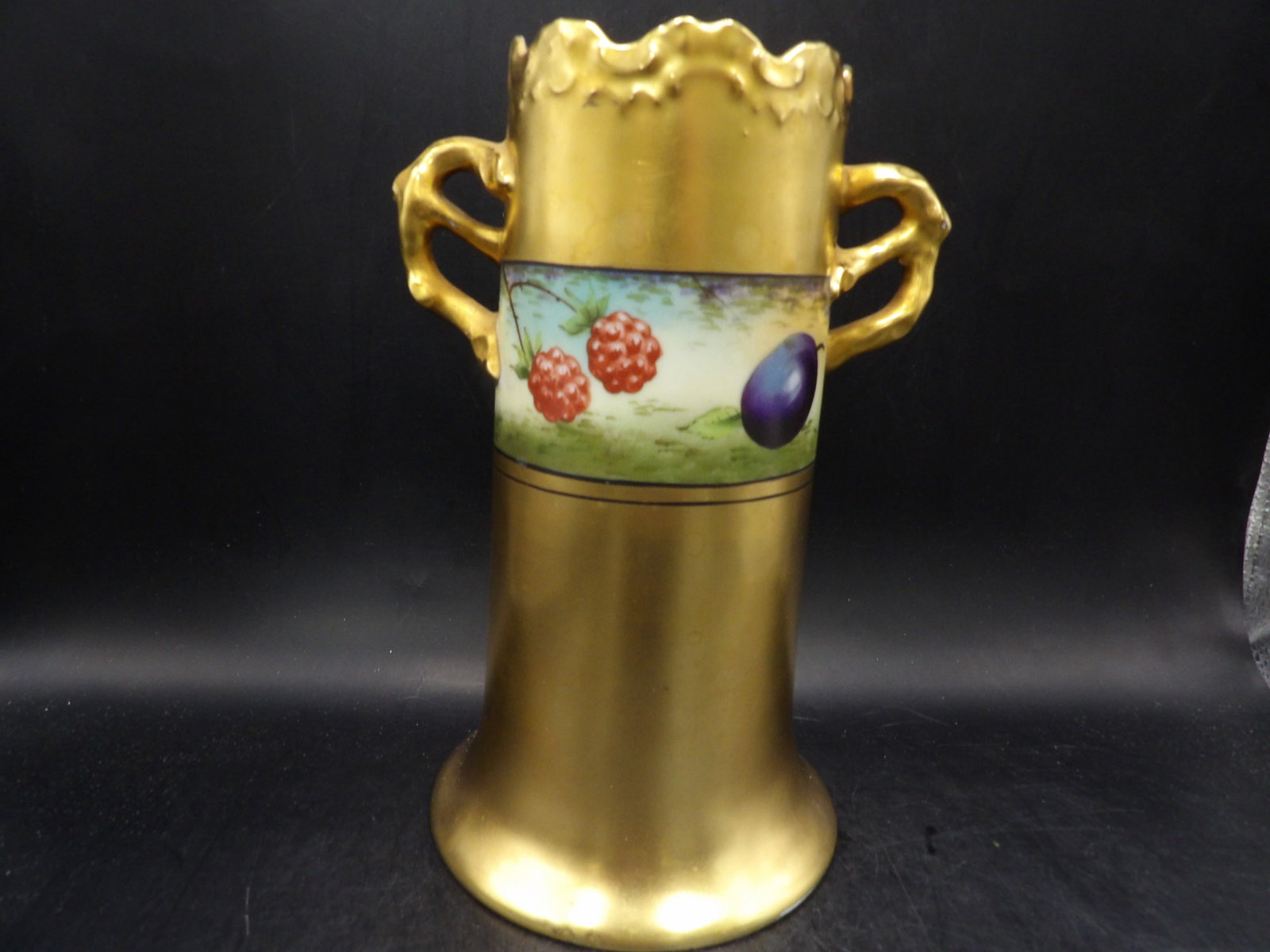 European gold gilt porcelain vase with hand painted fruits and ornate handles circa 1900: 8 inches height.