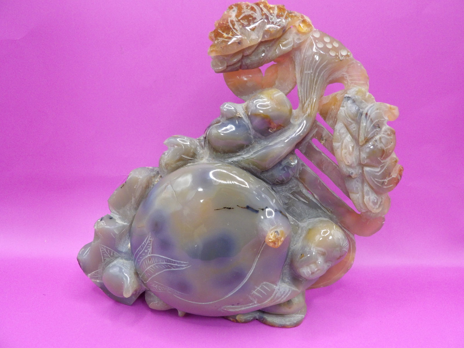 large Chinese agate carving of a boy holding a peach: 8.3 inches height. 2508 grams.