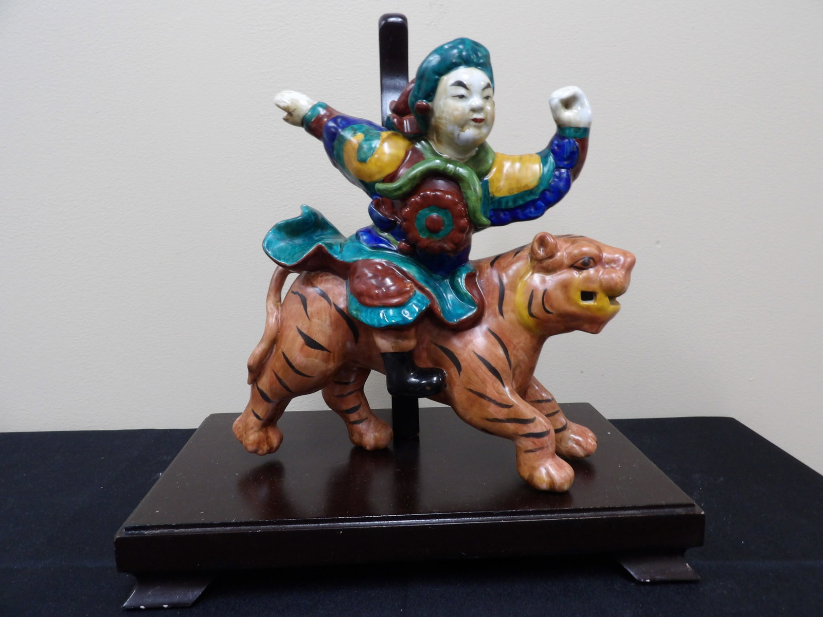 Chinese roof tile warrior riding a tiger on wooden base: Base size is 12 x 6.7 x 13 inches. Roof tile is 9 inches length.