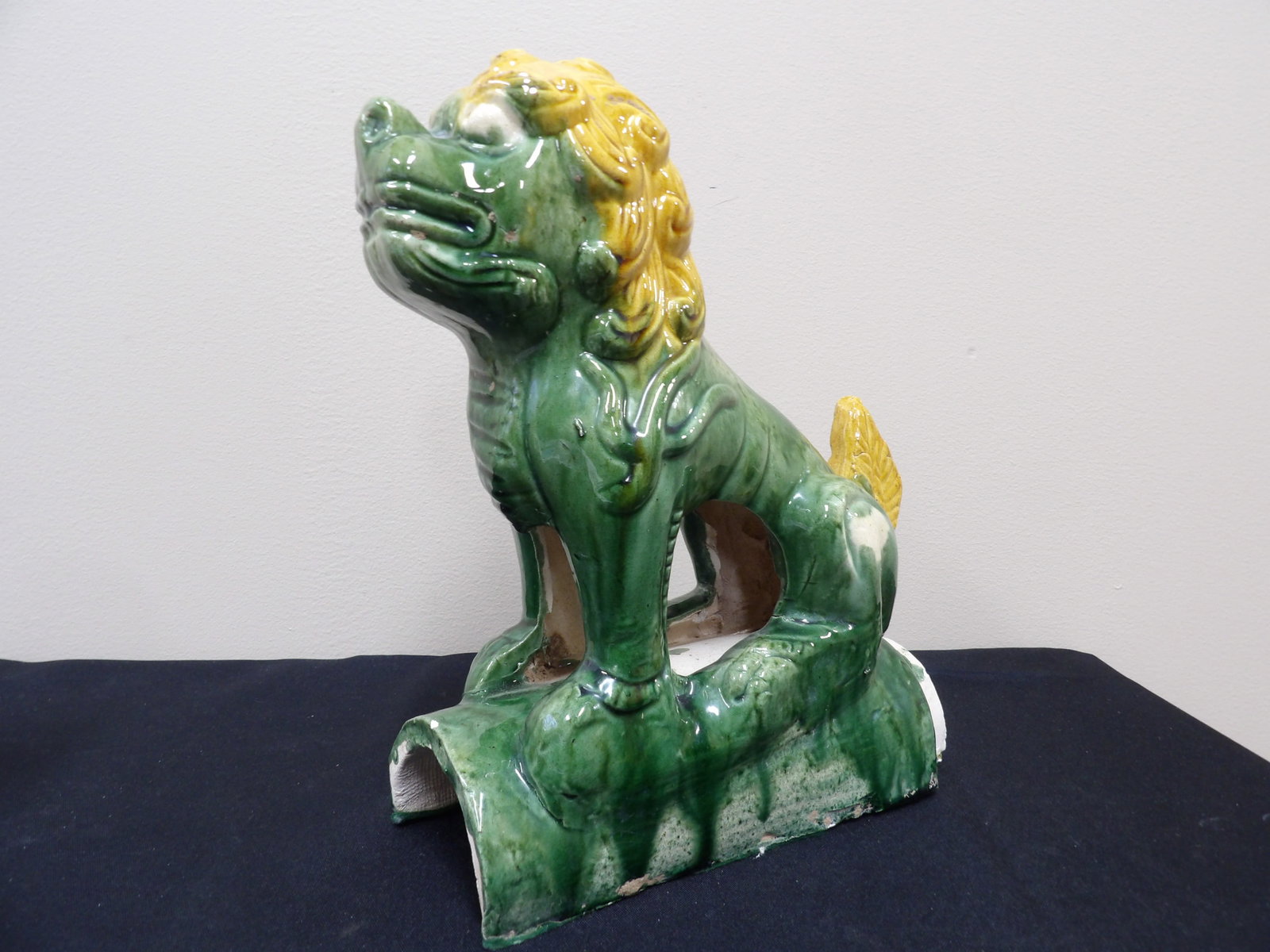 Chinese green and yellow glazed guardian lion roof tile: Approx. 10 inches height.
