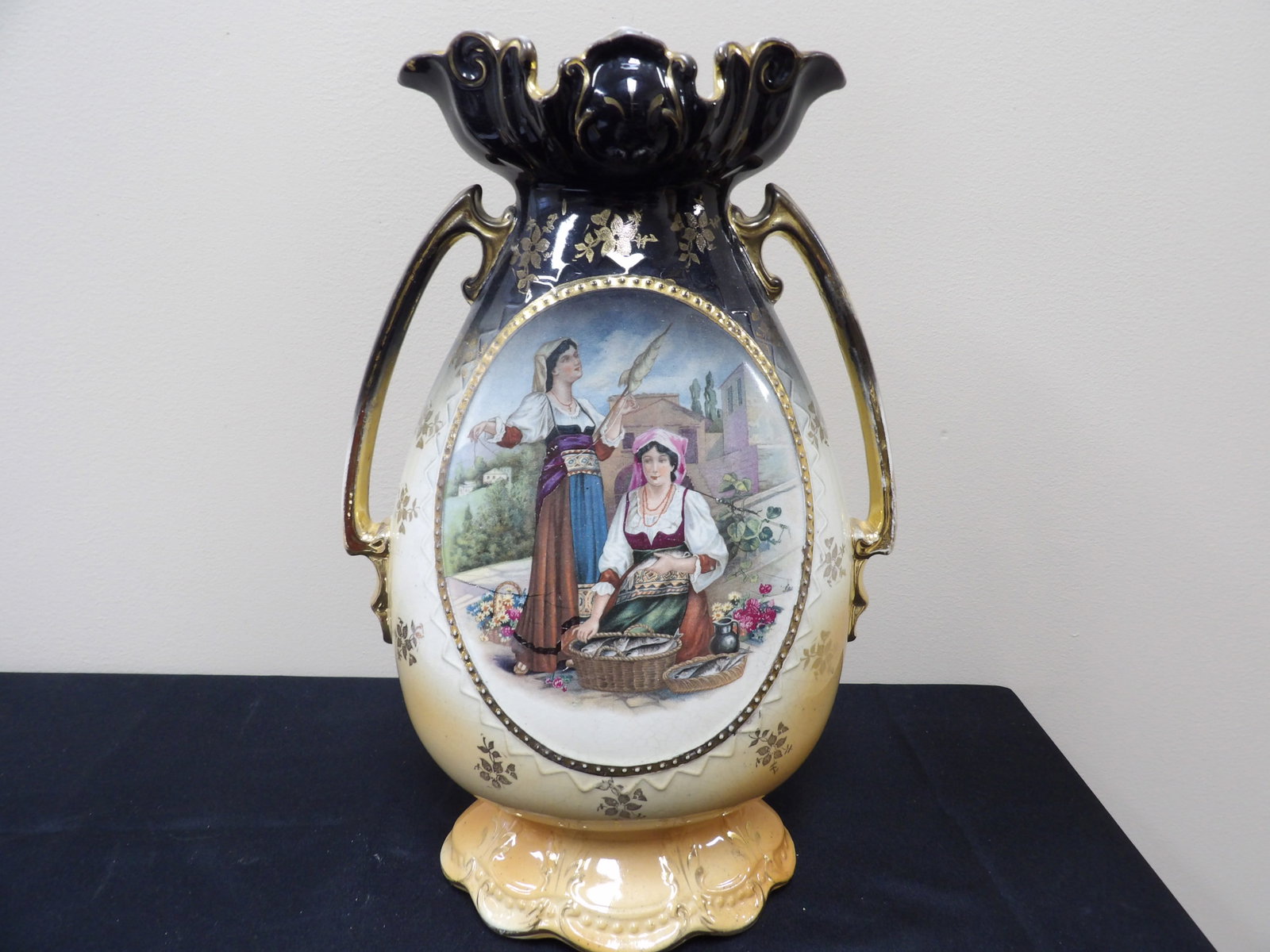 made in England Victorian vase with pastoral scene and gold accents circa 1900s: Approx. 14 inches height.