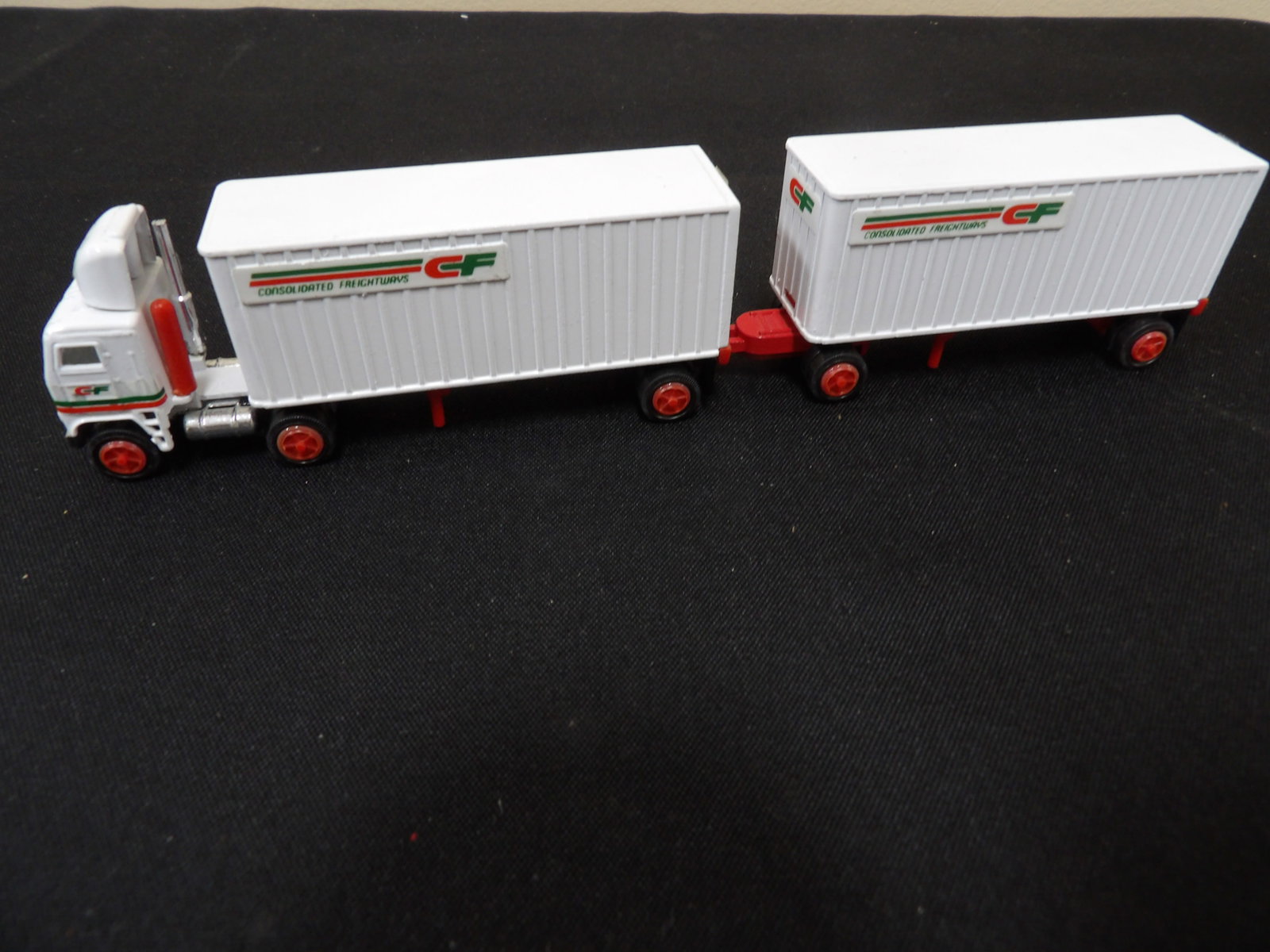 Tonkin diecast model of a Consolidated Freightways double trailer truck: 8 inches length.
