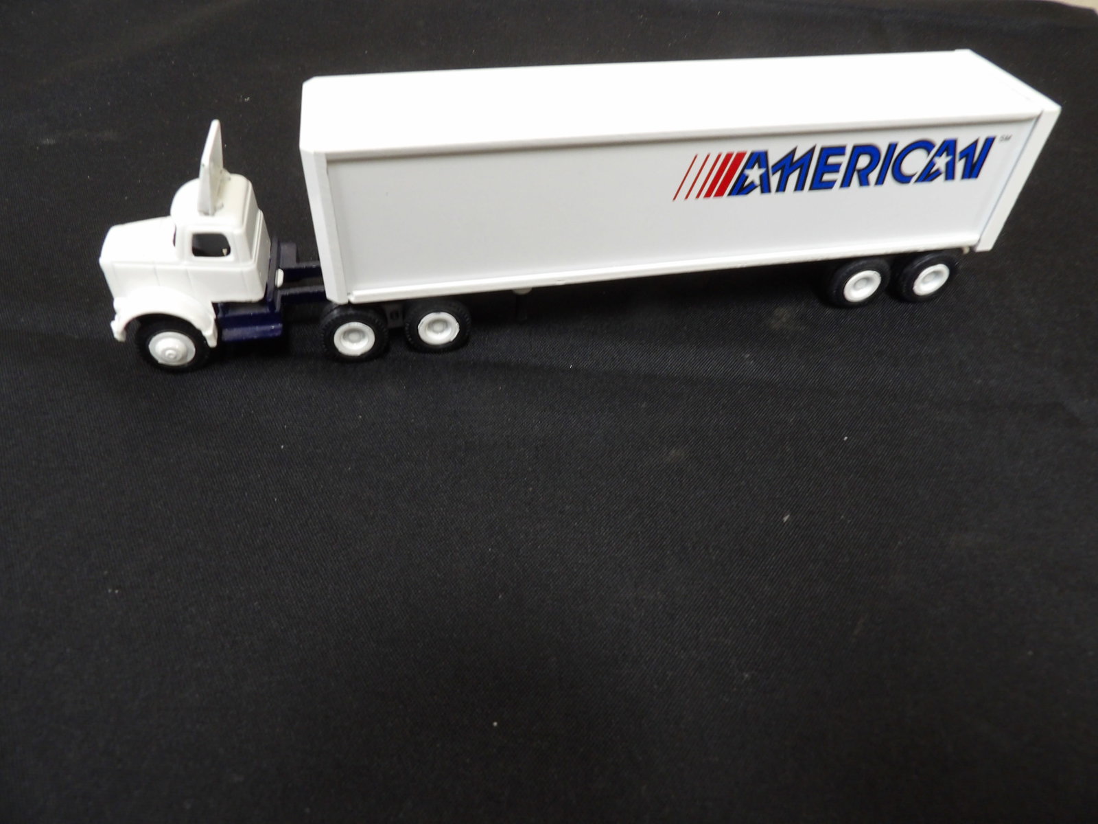 Wincross diecast model of semi-truck and trailer representing American Freight System: 9.2 inches length.