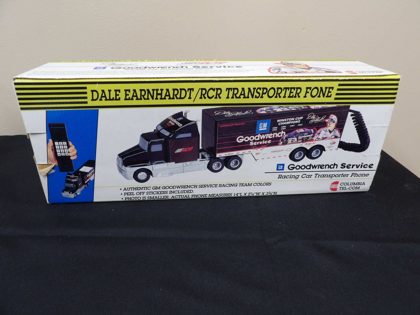 Dale Earnhardt Goodwrench racing car transport phone in original packaging: 15 inches length box. In original packaging appears unused.
