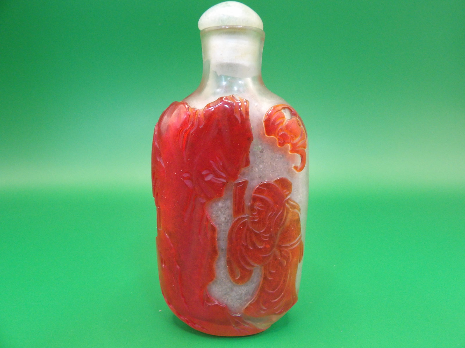 Chinese Qing dynasty red overlay glass snuff bottle with men's figures tree flowers bat: 3.4 inches height.