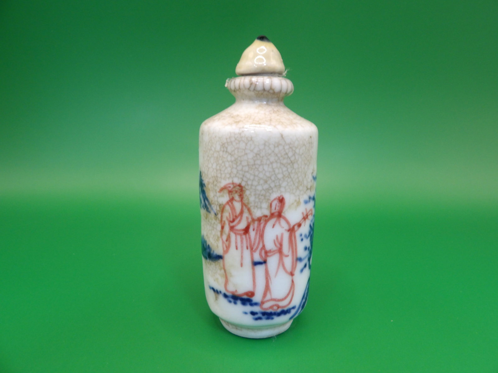 Chinese blue white red glazed crack porcelain snuff bottle signed: 3.3 inches height.
