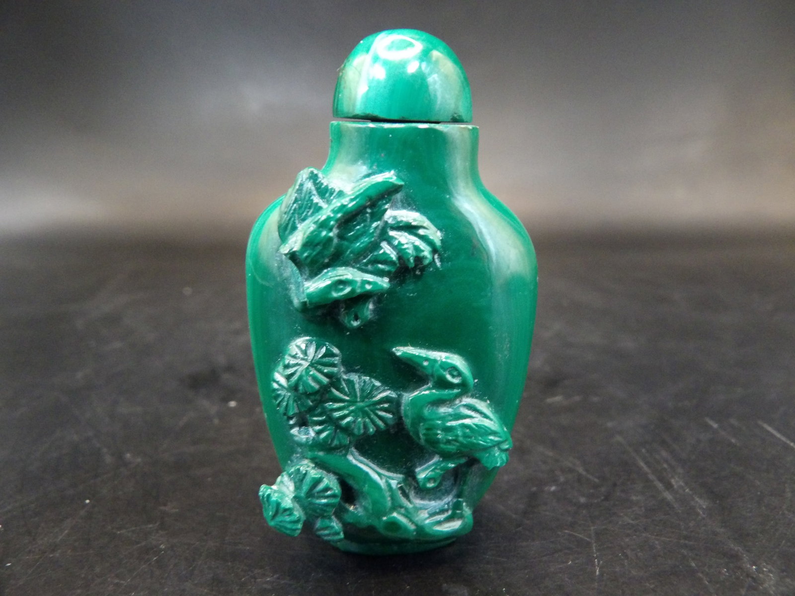 antique Chinese carved malachite snuff bottle with crane prunus blossom motif: 2 inches height.