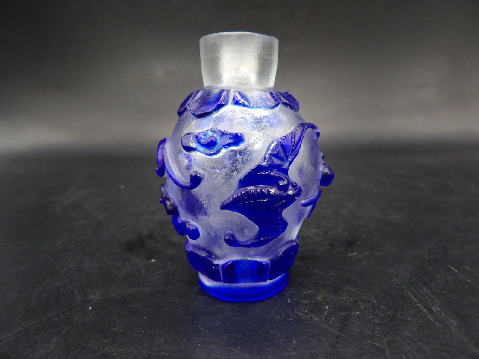 Chinese blue overlay glass snuff bottle with Chilong bat motif: 2.1 inches height.
