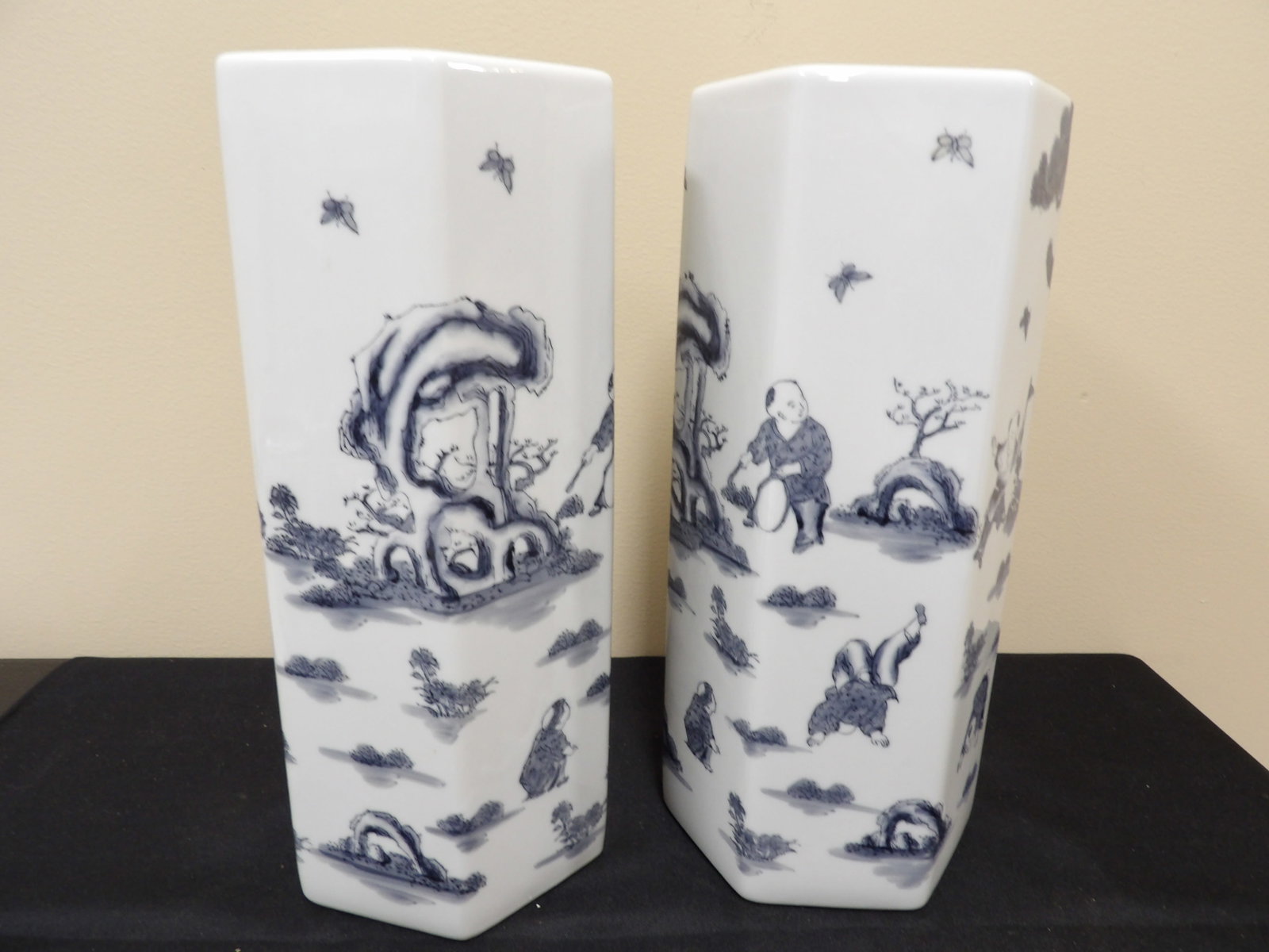 pair of Chinese porcelain hat stands with children playing scene: 12.5 inches height.