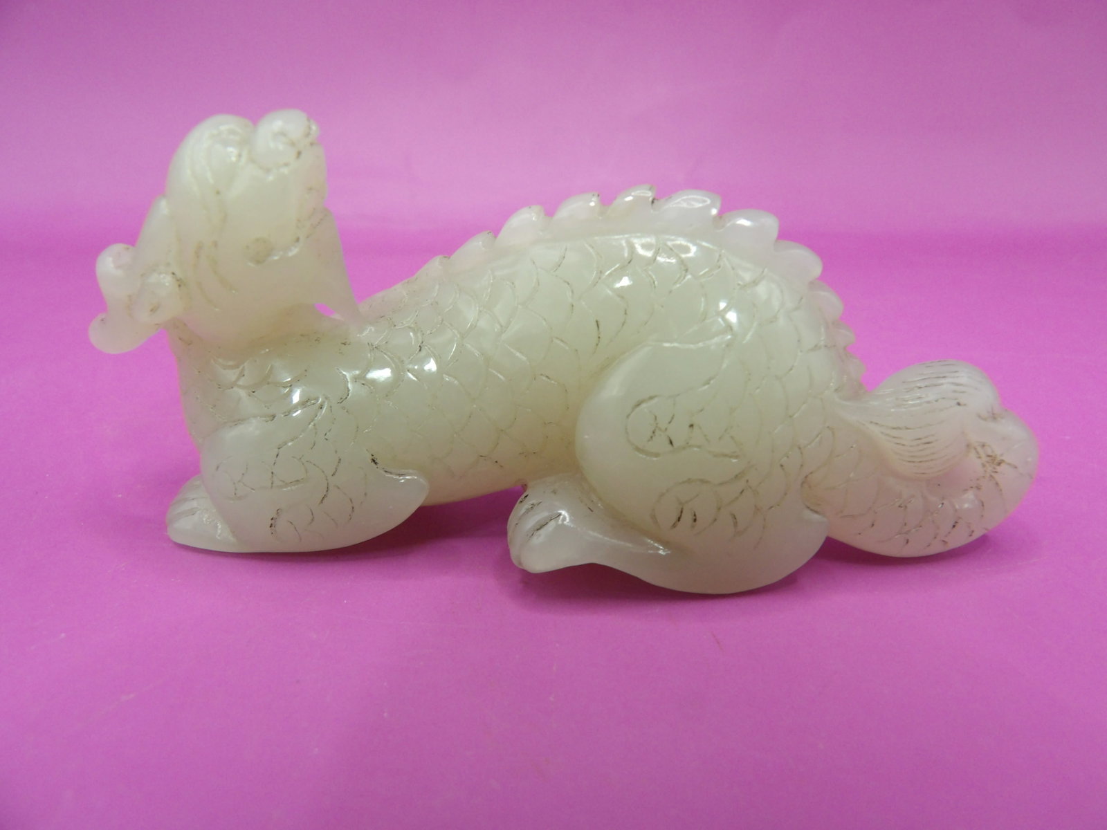 Chinese fine carved jade dragon figurine: 3.4 inches length. 66 grams. We will inhouse ship items to you very affordable and efficient. Select self-arrange shipping.