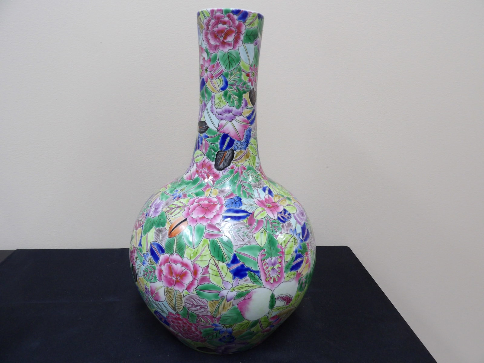 Chinese famille rose porcelain vase with floral decoration: Approx 16 inches height. We will inhouse ship items to you very affordable and efficient. Select self-arrange shipping.
