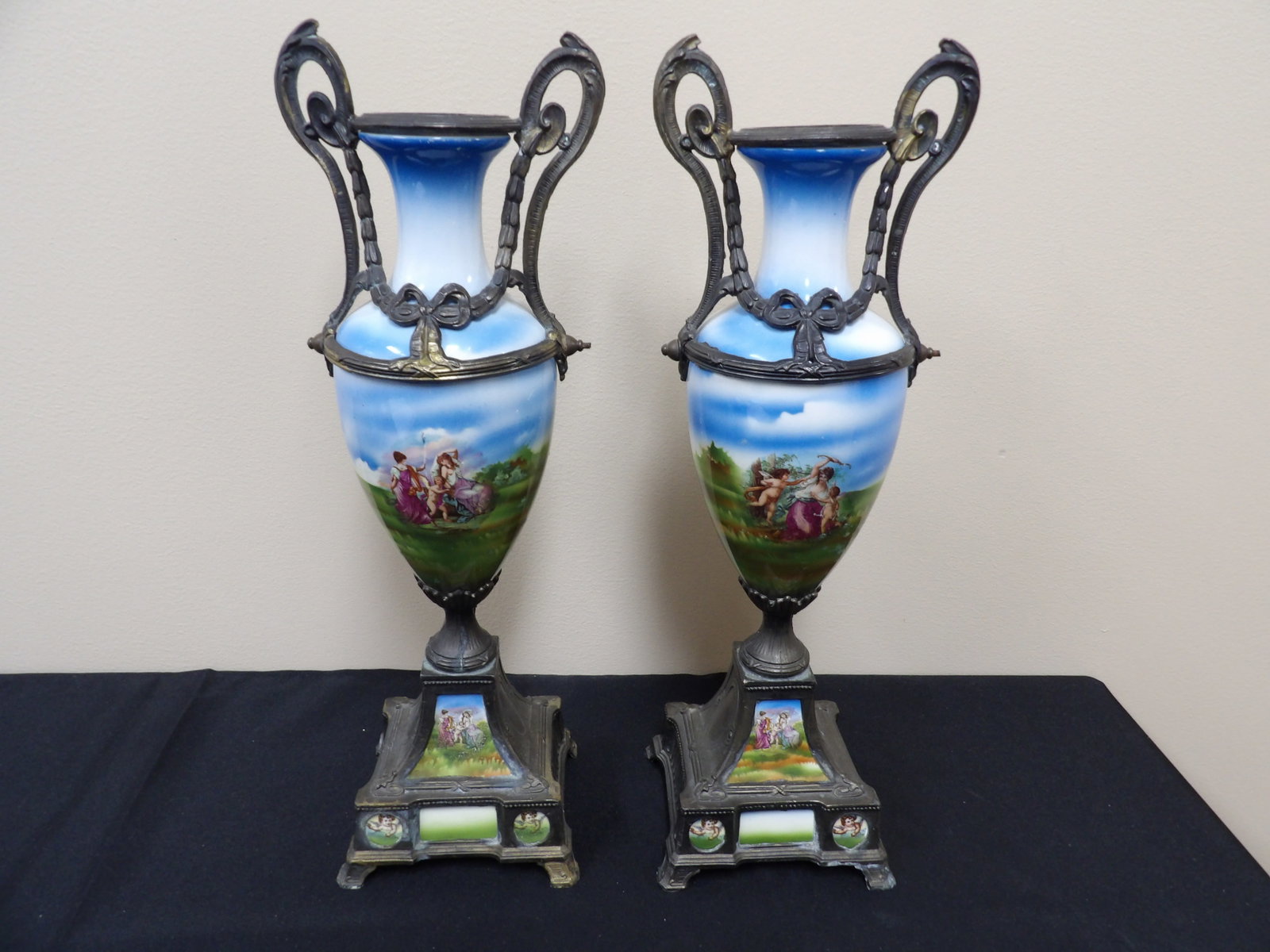 Antique pair of hand painted French porcelain and mixed metal amphora vases: 15.5 inches height. We will inhouse ship items to you very affordable and efficient. Select self-arrange shipping.