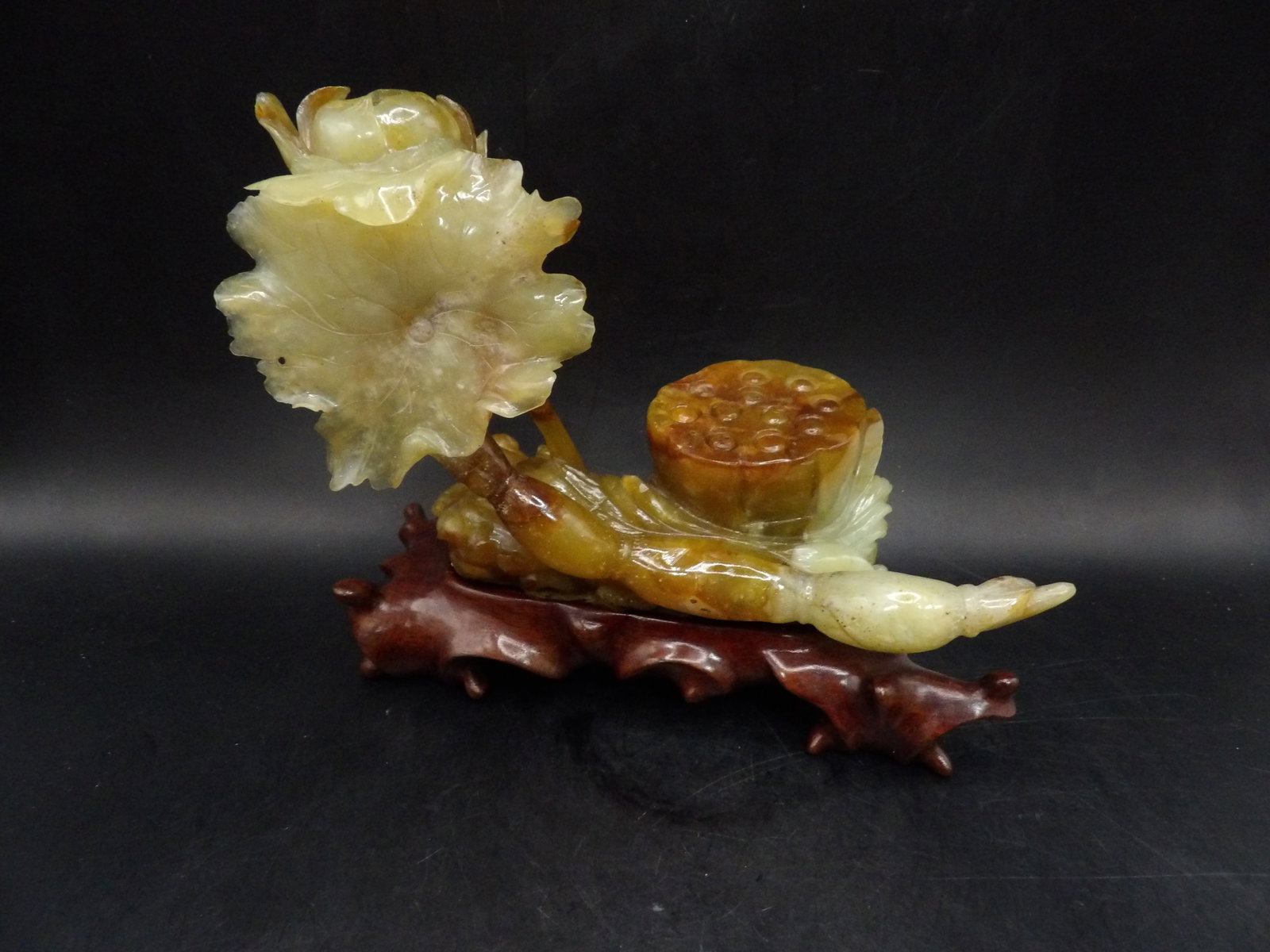 Very fine Chinese agate lotus pond scene carving on custom wooden base: 7.5 inches length. We will inhouse ship items to you very affordable and efficient. Select self-arrange shipping.