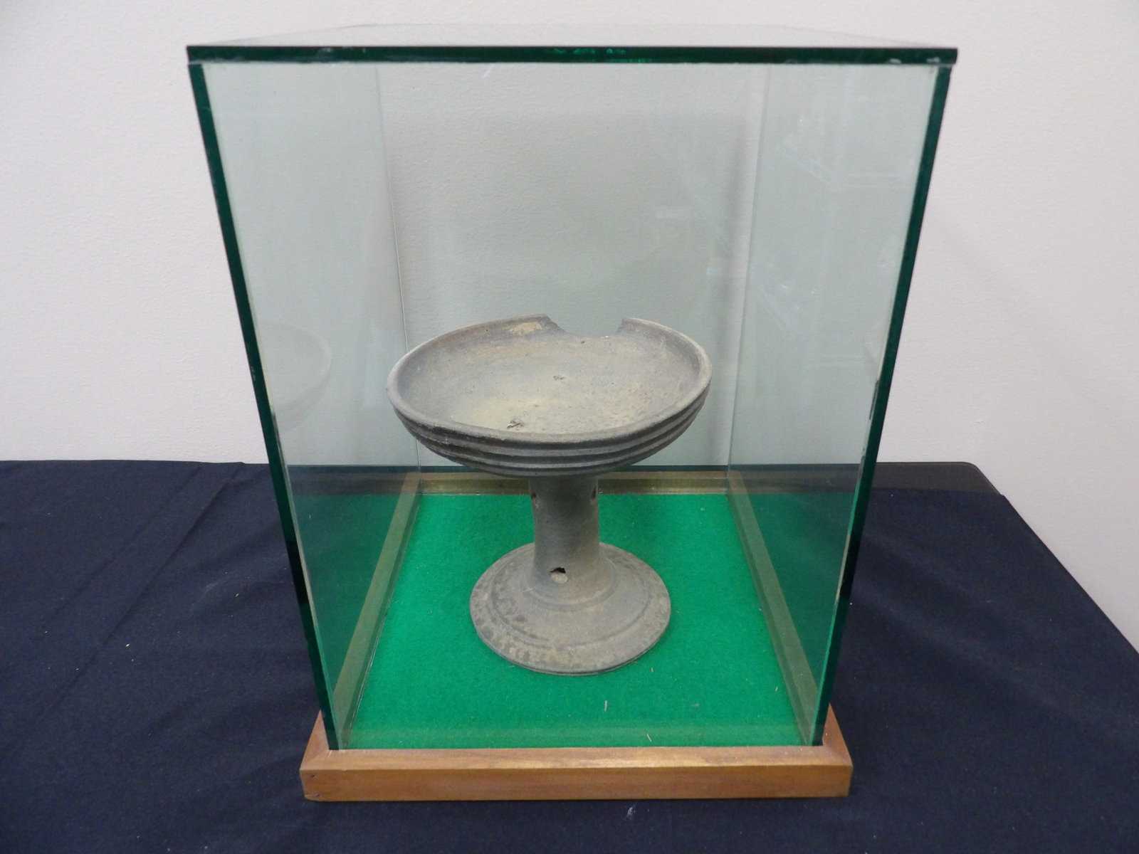 Ancient pottery in a large thick and heavy glass display case.: Unsure about the origin of the pottery item (6.3 inches height). Glass display case is 13 inches height. We will inhouse ship items to you very affordable and efficient. Select self-arrange shipping.