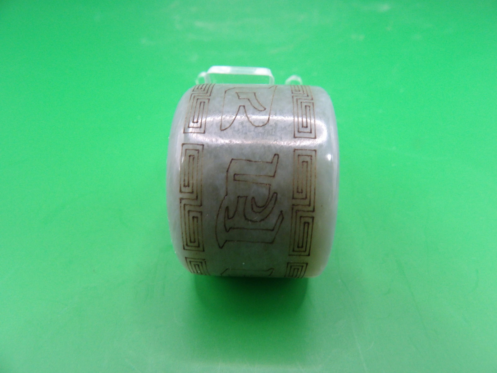 Chinese carved jade archer's ring: 1 inches height. 40 grams. We will inhouse ship items to you very affordable and efficient. Select self-arrange shipping.