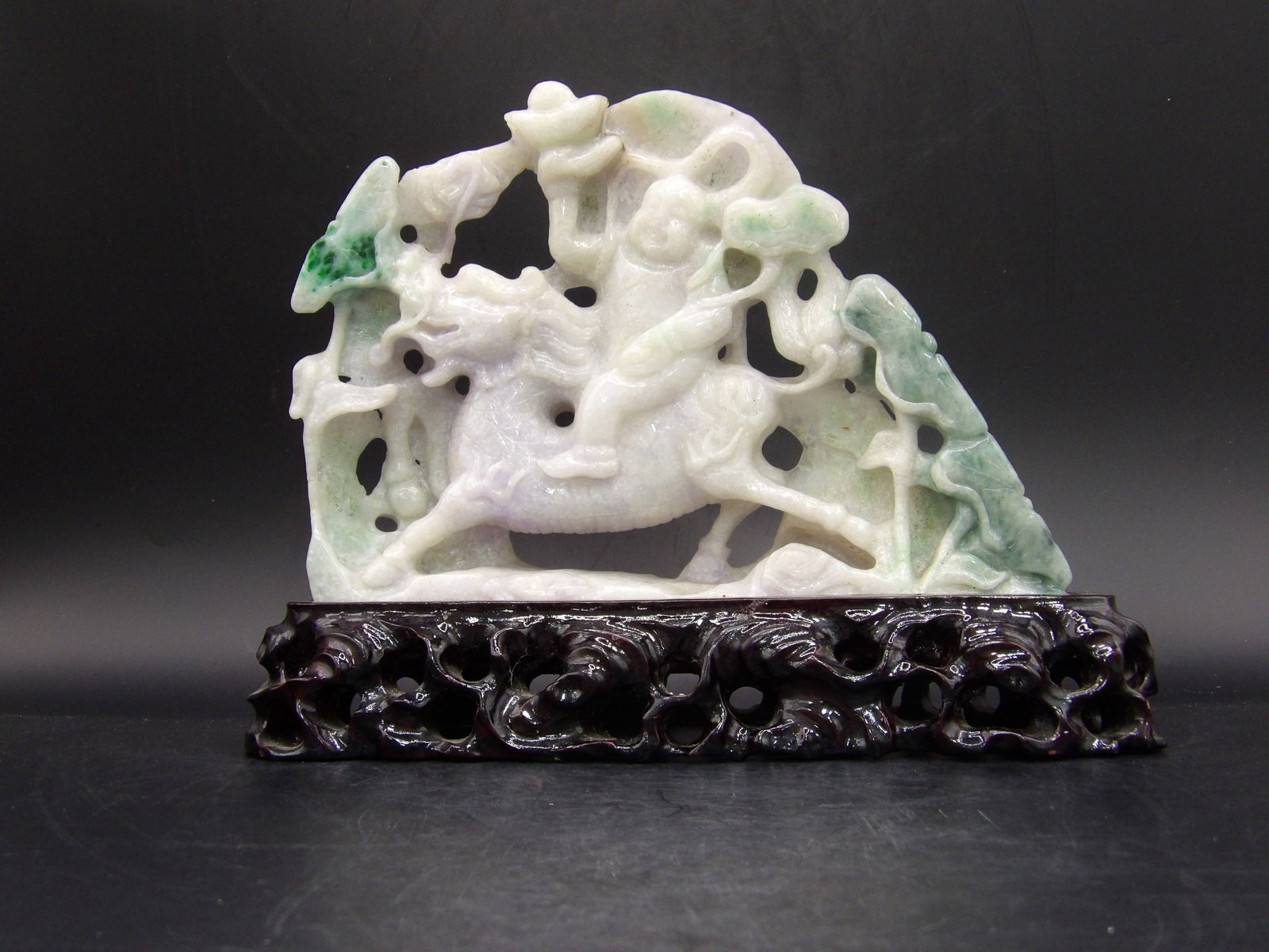 Chinese Jadeite Jade Boy Riding A Beast Carving: Jadeite jade carving without stand size:7.2 x 5 x 1 inches. The statue is adhered to the stand. Total weight including wood stand is 938 grams. We will inhouse ship items to you very affordable and