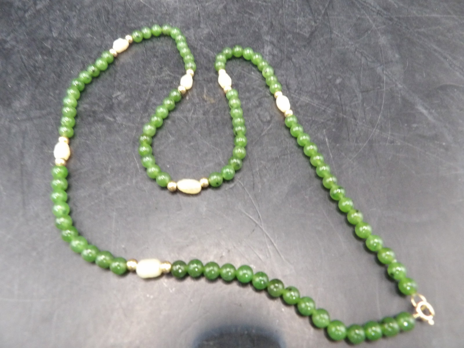 14k gold jade and pearl beaded necklace marked 14k: Marked 14k on the clasp. 18 inches long. 12 grams. We will inhouse ship items to you very affordable and efficient. Select self-arrange shipping.