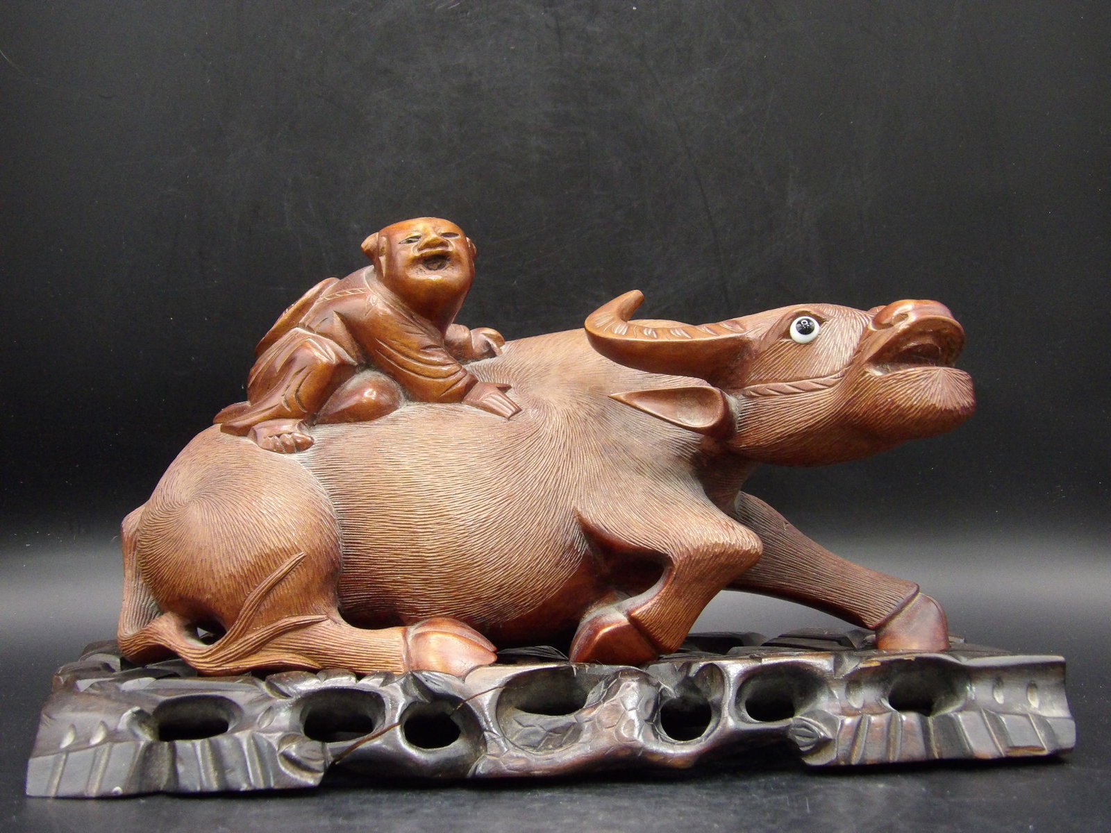 Chinese carved Boy Riding Water Buffalo statue custom ornate base 9 inches length: 9 x 4 x 4.5 inches. Custom ornate stand. Old wood crack line shown in the picture. We will inhouse ship items to you very affordable and efficient. Select self-arrange shipping.