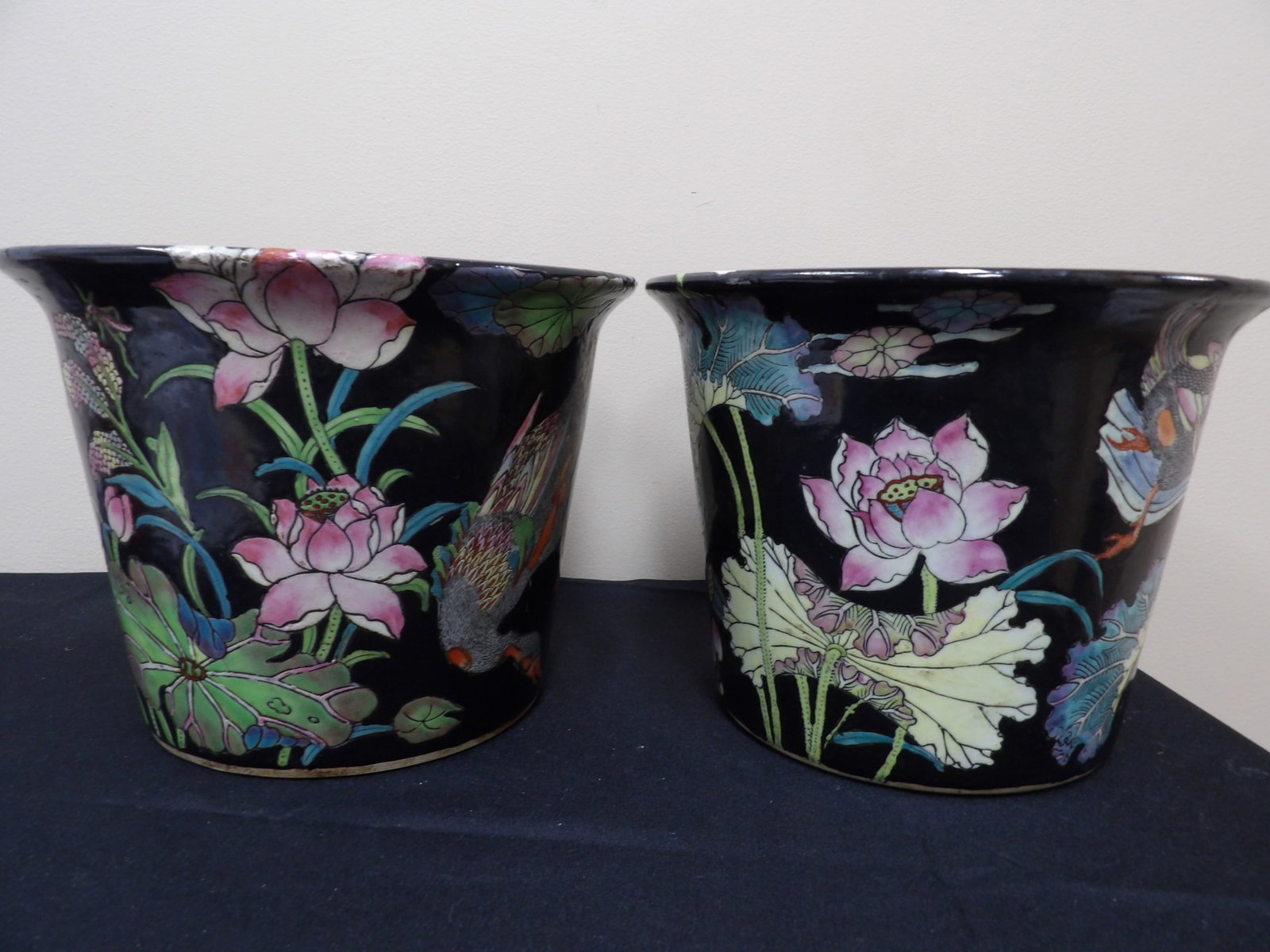 Pair of Chinese Famille Noire planters with water lilies and duck motifs: Size is 9.5 x 9.5 x 7.3 inches. We will inhouse ship items to you very affordable and efficient. Select self-arrange shipping.
