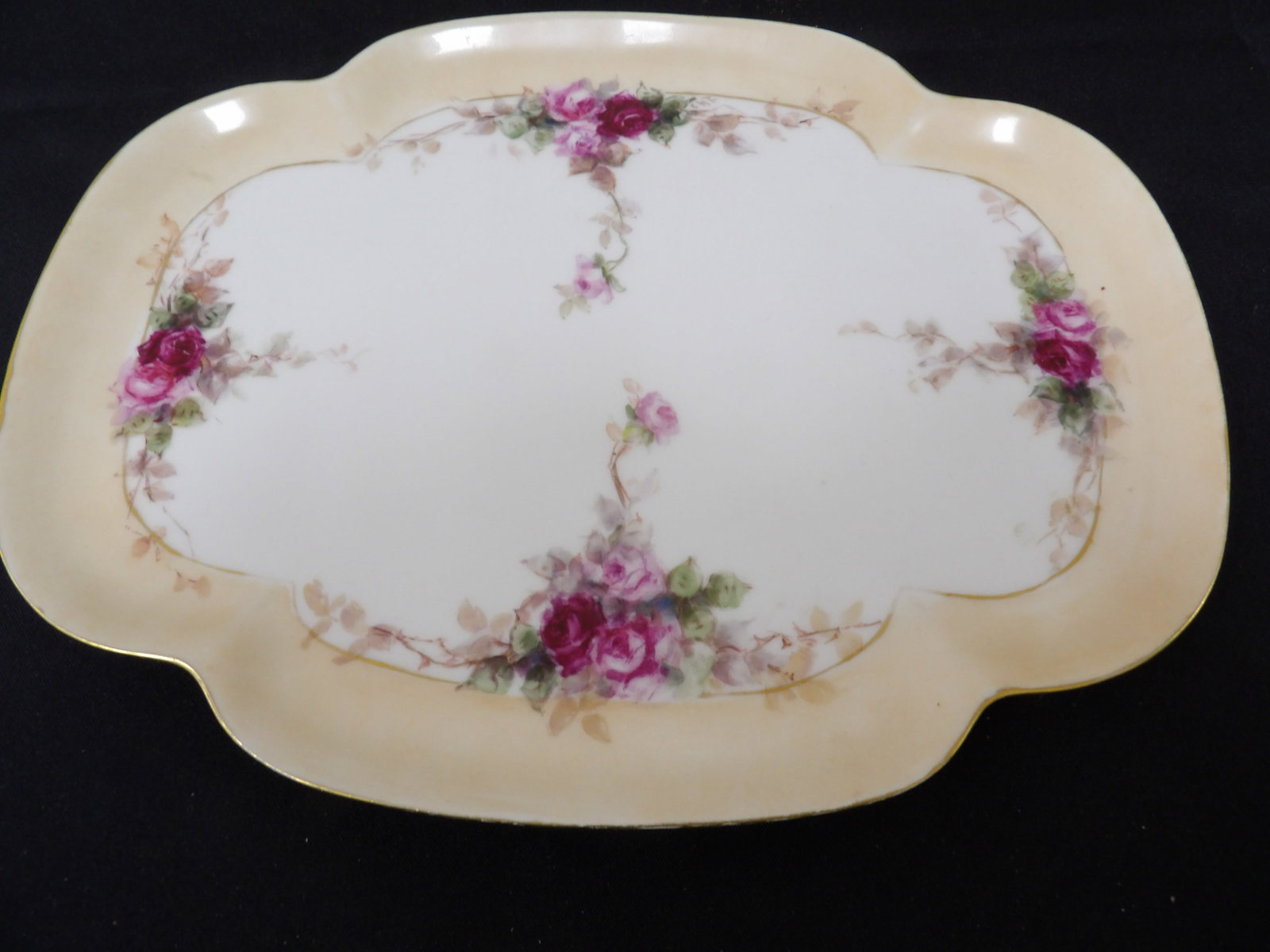 hand painted porcelain tray with roses and gold rim circa 1920 to 1940: Approx. 12 inches length. We will inhouse ship items to you very affordable and efficient. Select self-arrange shipping.