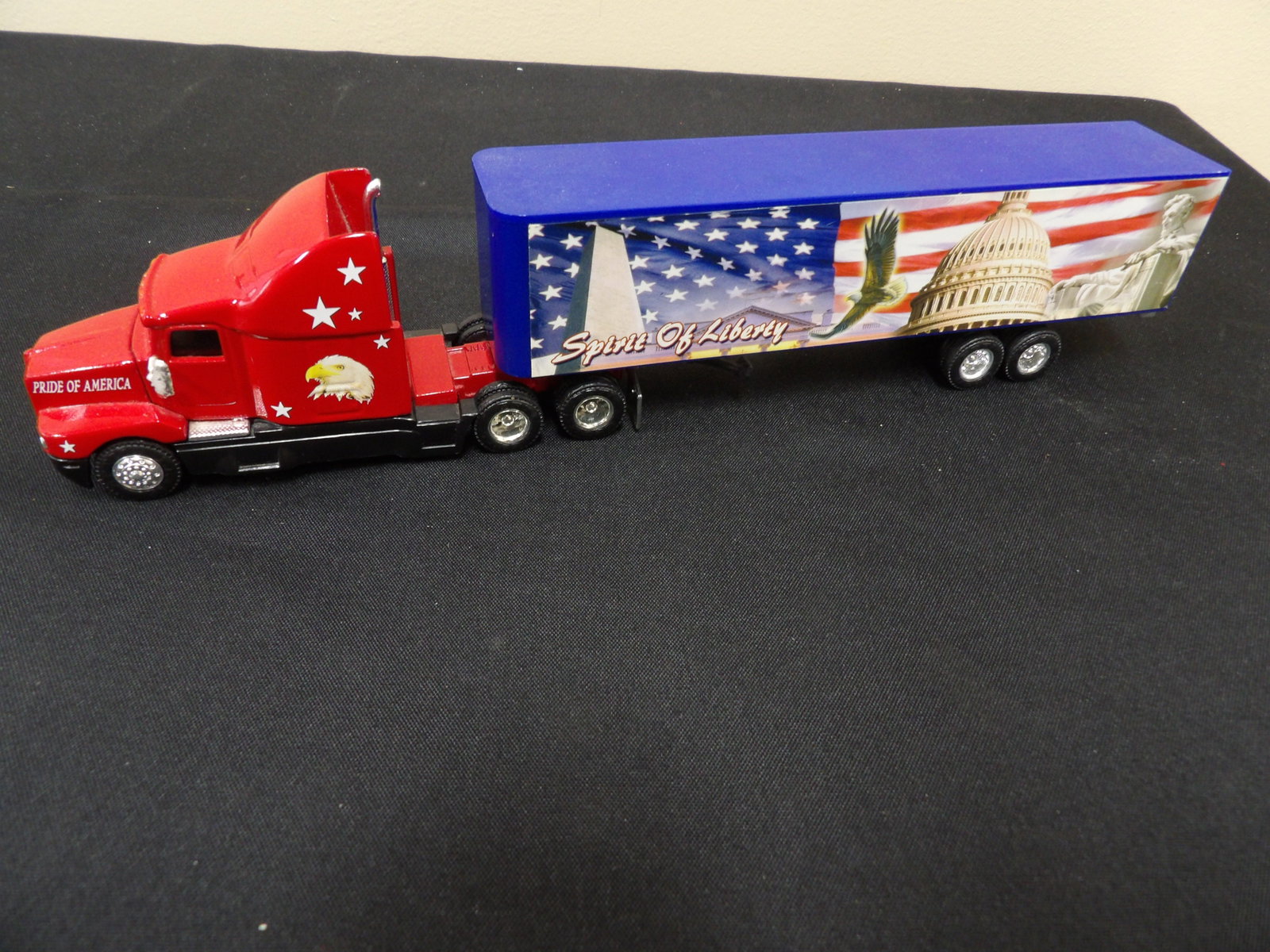 ERTL Spirit of Liberty patriotic semi-trailer truck: 11.4 inches length. We will inhouse ship items to you very affordable and efficient. Select self-arrange shipping.