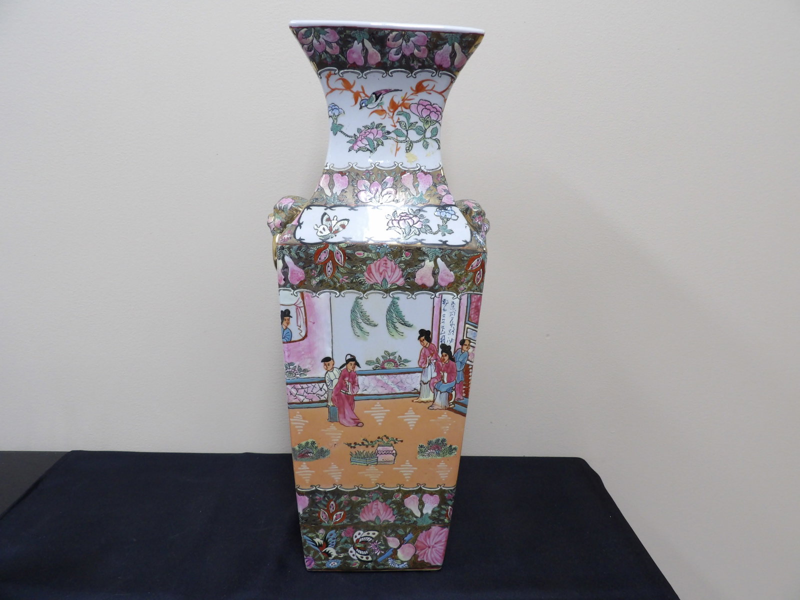 Chinese famille rose octagonal vase with figural floral decoration and lion heads: 18.8 inches height. We will inhouse ship items to you very affordable and efficient. Select self-arrange shipping.