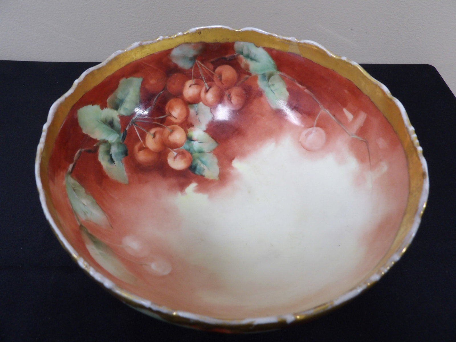 antique hand painted Limoges porcelain punch bowl with gilt rim and cherry deco signed: 9.3 inches bowl opening. We will inhouse ship items to you very affordable and efficient. Select self-arrange shipping.