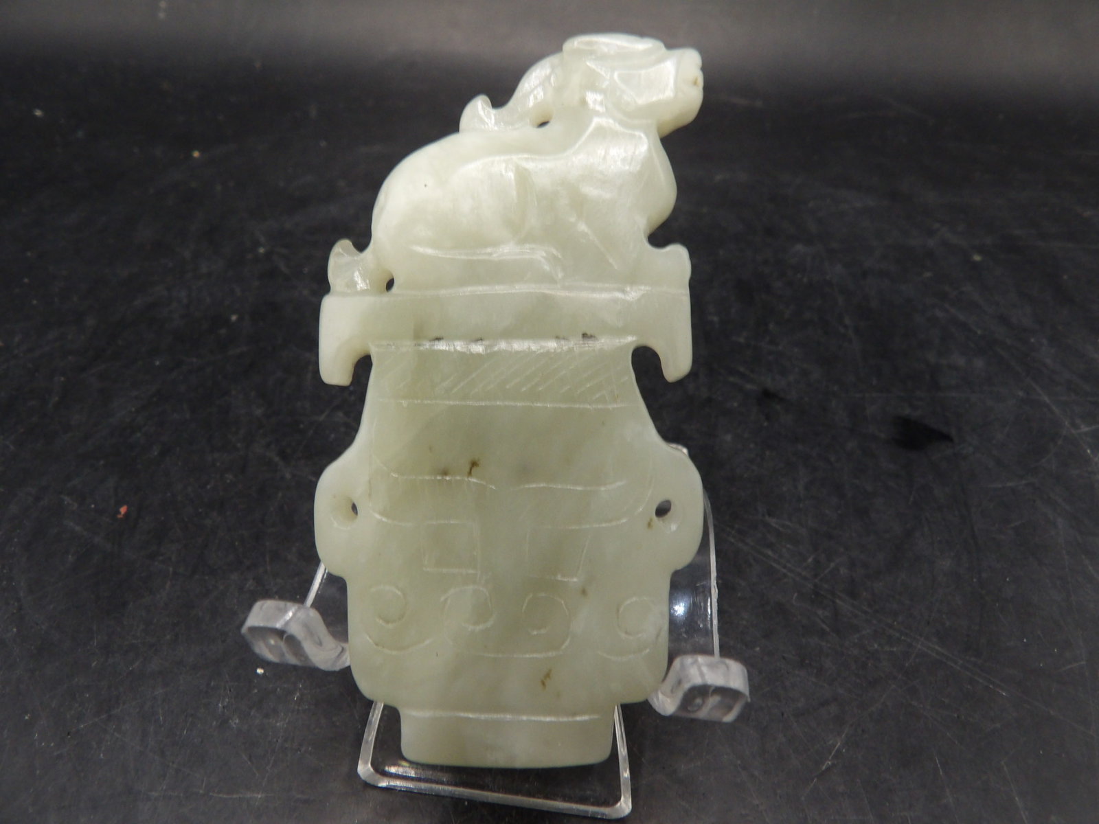 Chinese jade carved pendant with beast and face motifs: 2.5 inches height. 47 grams. We will inhouse ship items to you very affordable and efficient. Select self-arrange shipping.