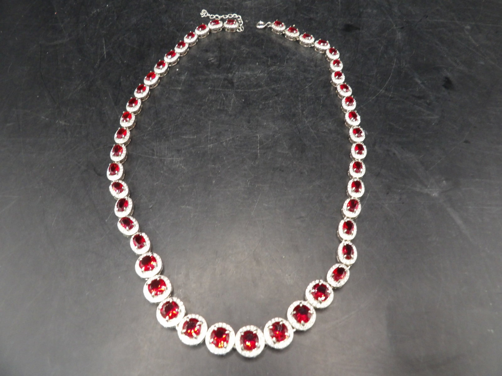 elegant simulated ruby tennis necklace with simulated ruby surrounded by CZ (1 of 6)