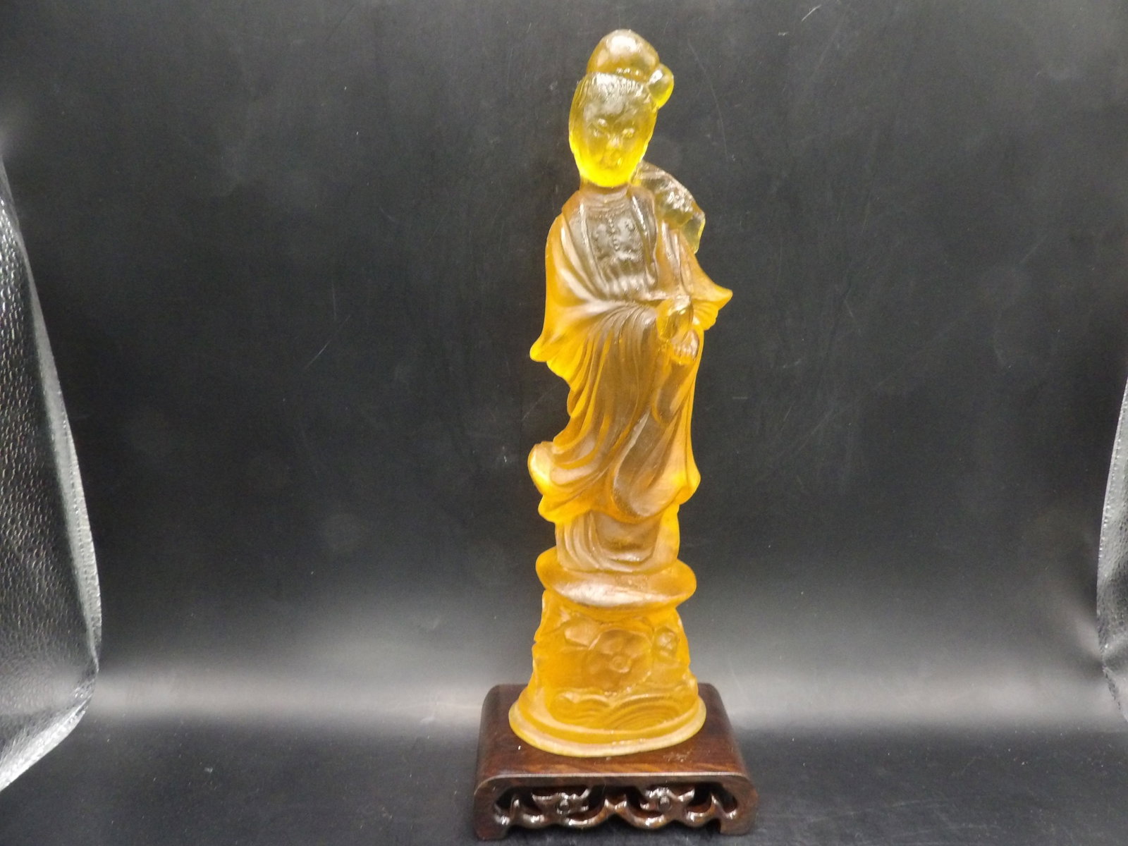 Chinese amber Kwan Yin figurine with wooden base: 10.3 inches height. We will inhouse ship items to you very affordable and efficient. Select self-arrange shipping.