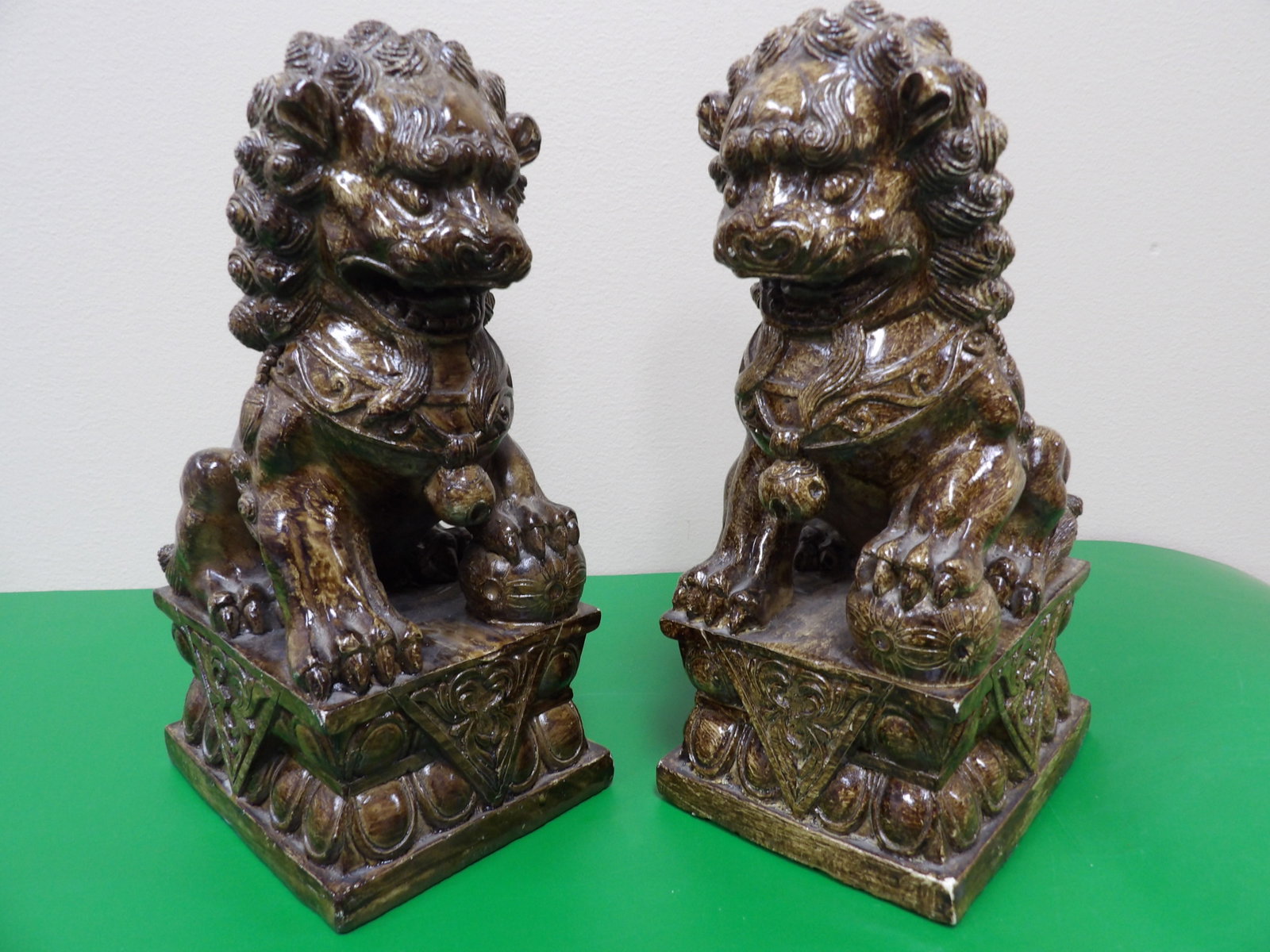 very fine pair of Chinese carved wooden foo dog guardian lion statues: Approx. 9 inches height.