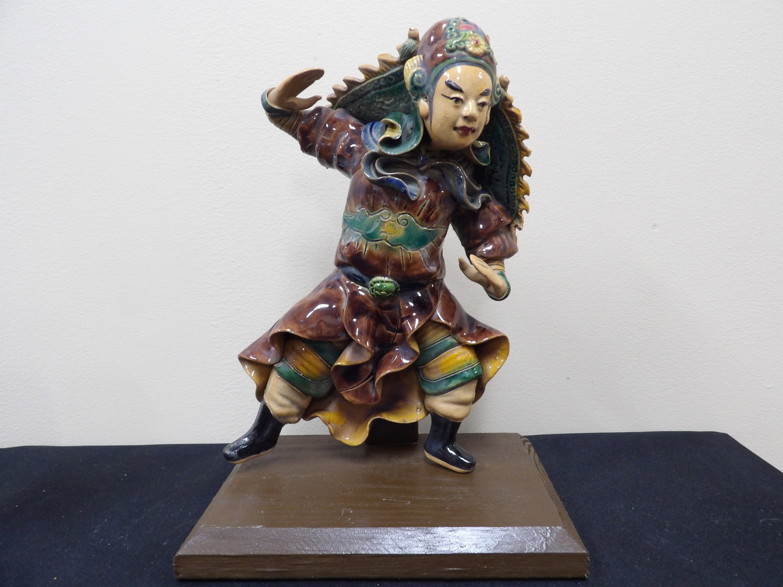 antique Chinese standing warrior roof tile on wood base: Approx. 11 inches height including the wooden base.