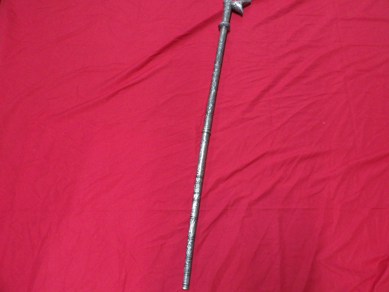 ornate silver plated metal walking stick or cane with animalistic handle: 37 inches height.