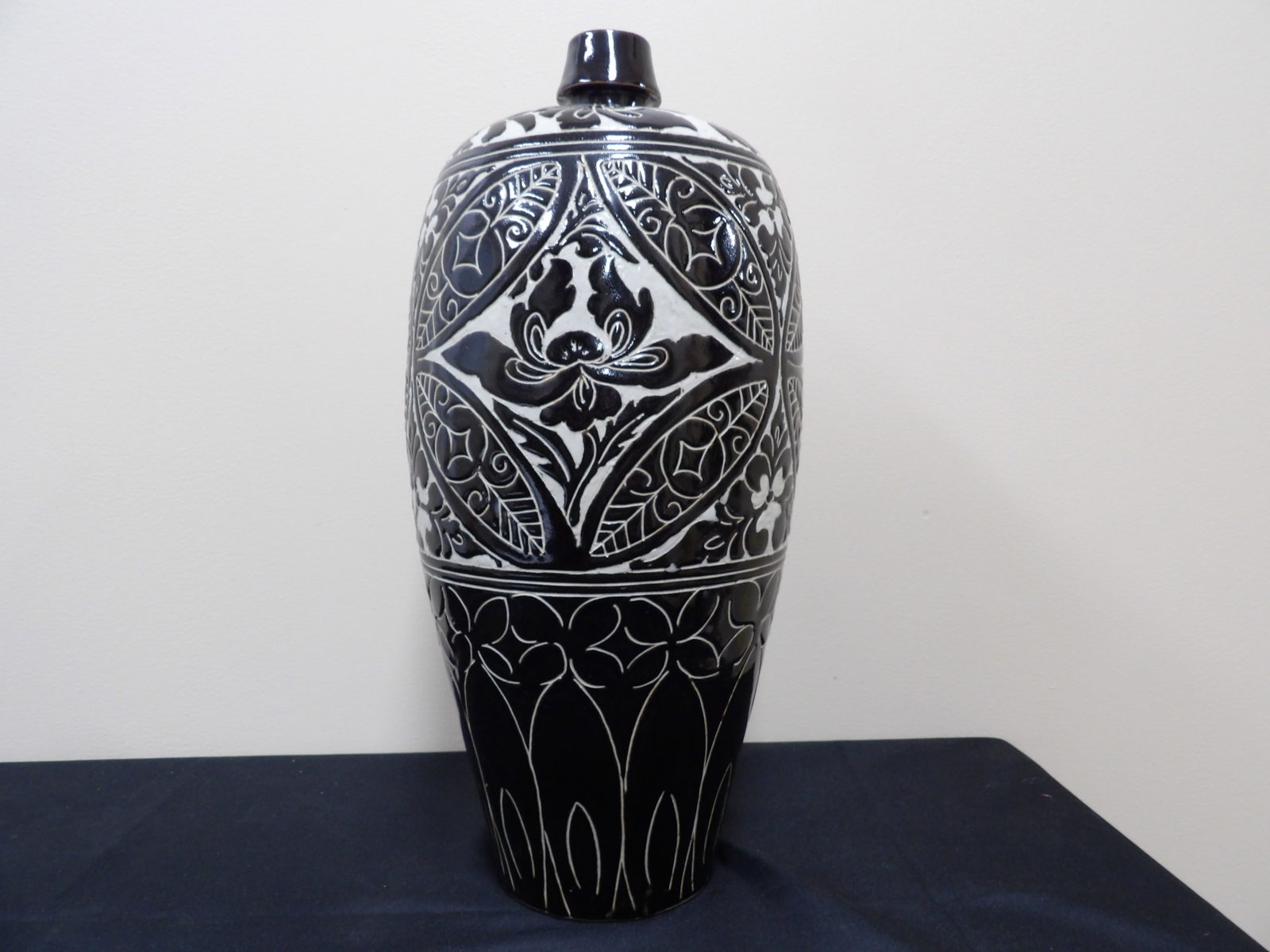 Chinese Cizhou style black glazed vase or urn with carved floral motif (1 of 8)