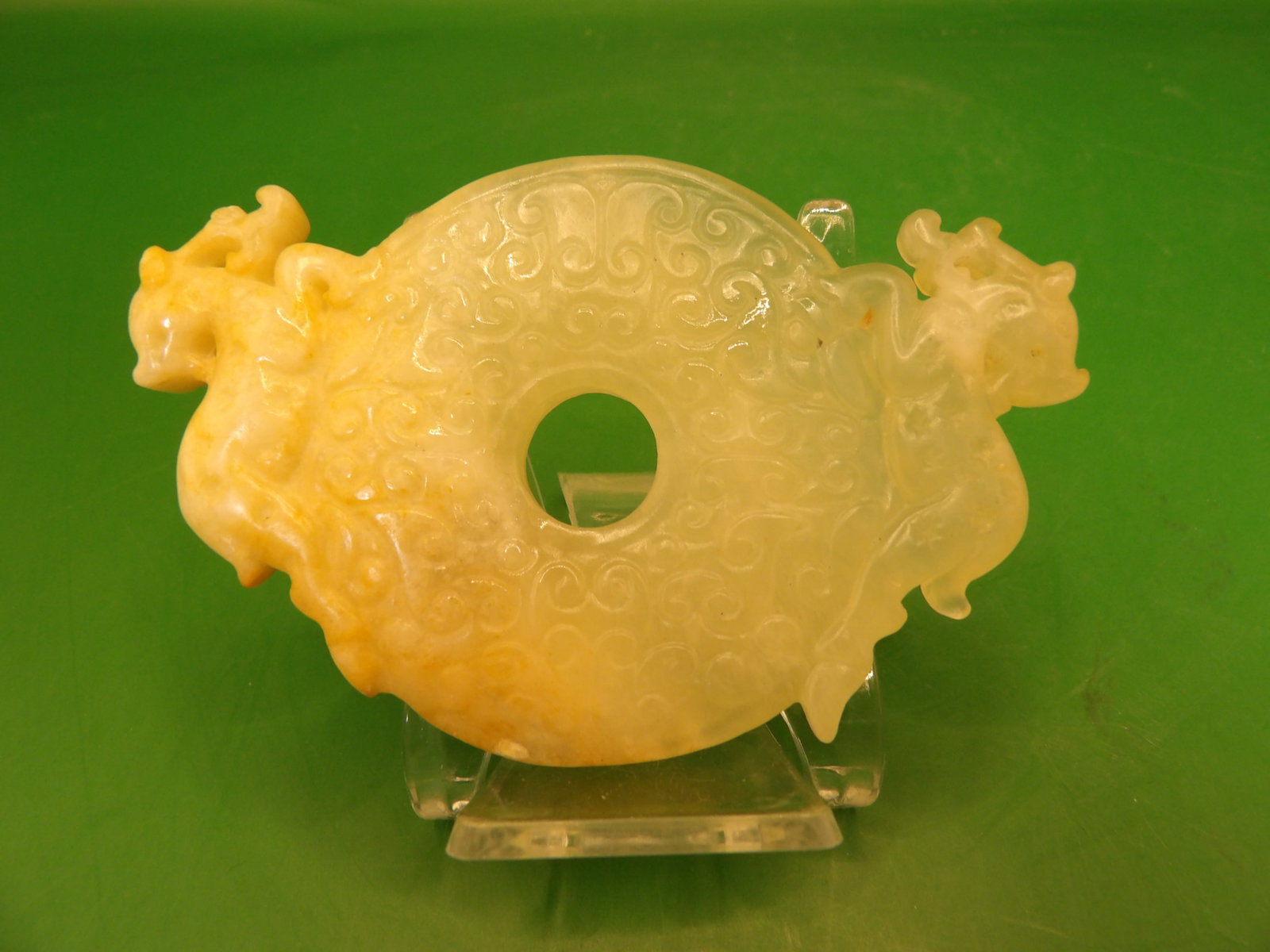 Chinese carved jade pendant with dragon motif: 3 inches long. 42 grams.
